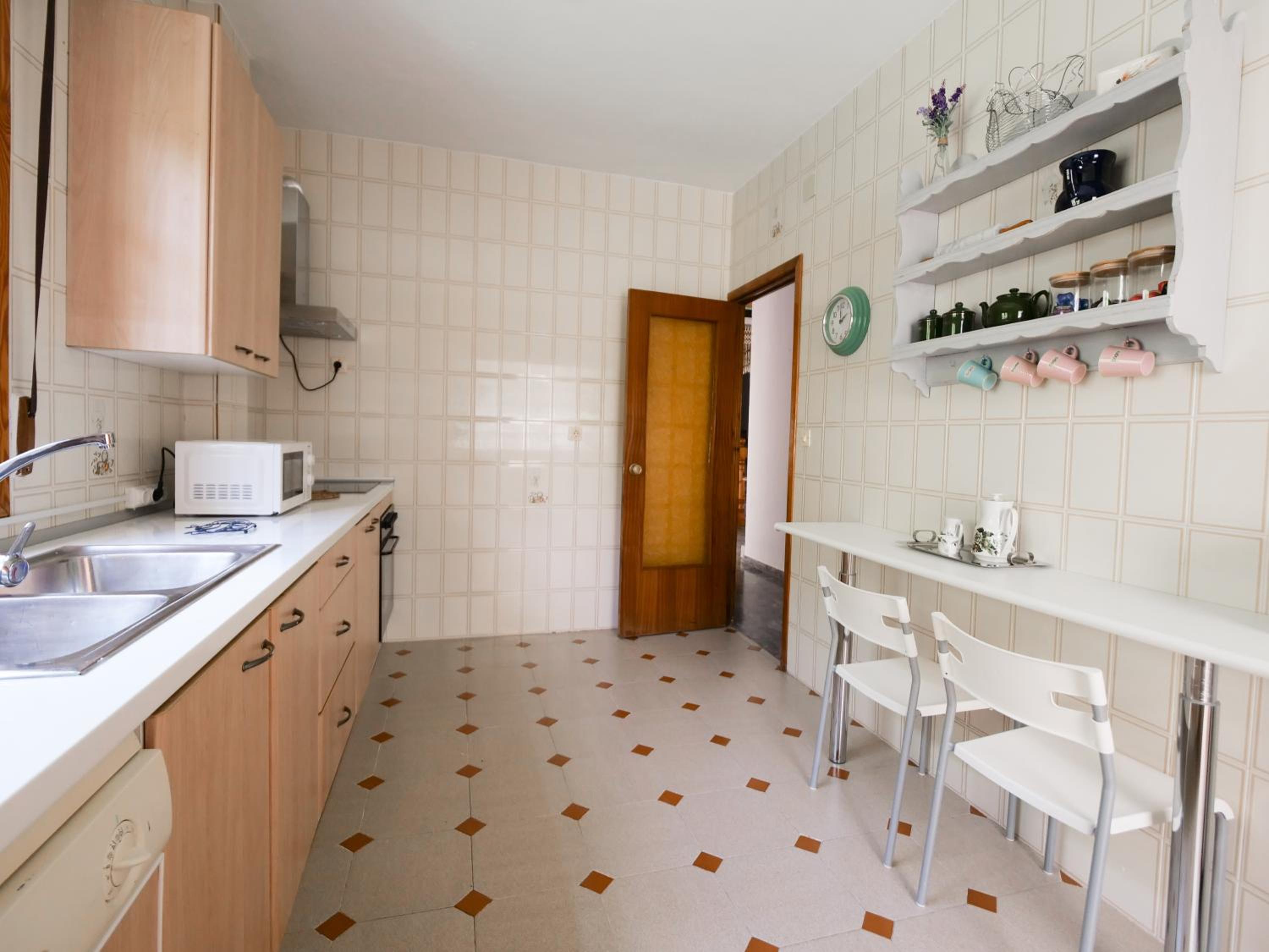 Four-Bedroom House - Photo 26