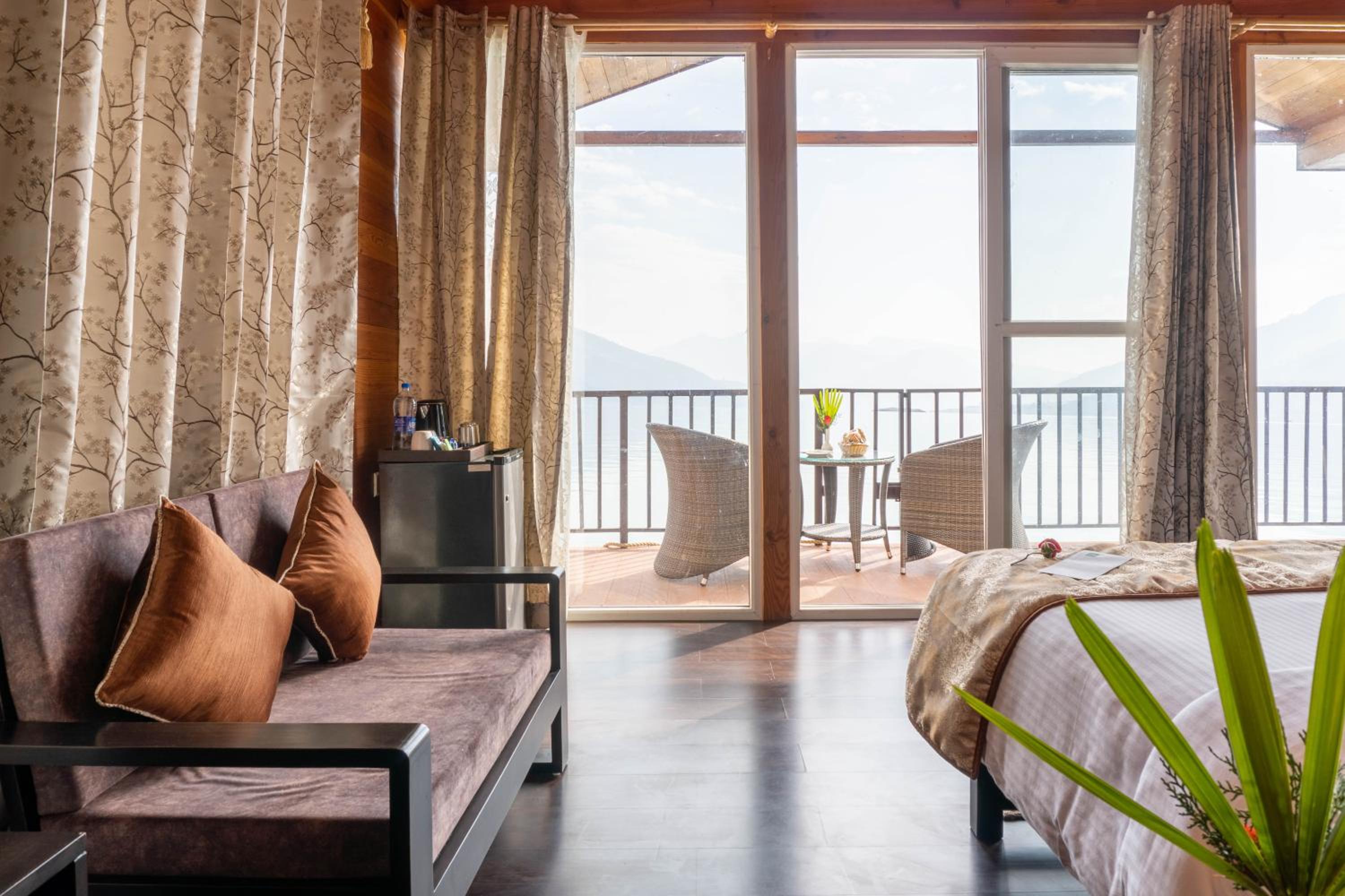 Floating Huts (Over the Lake) with Complimentary Two-way Port Transfers