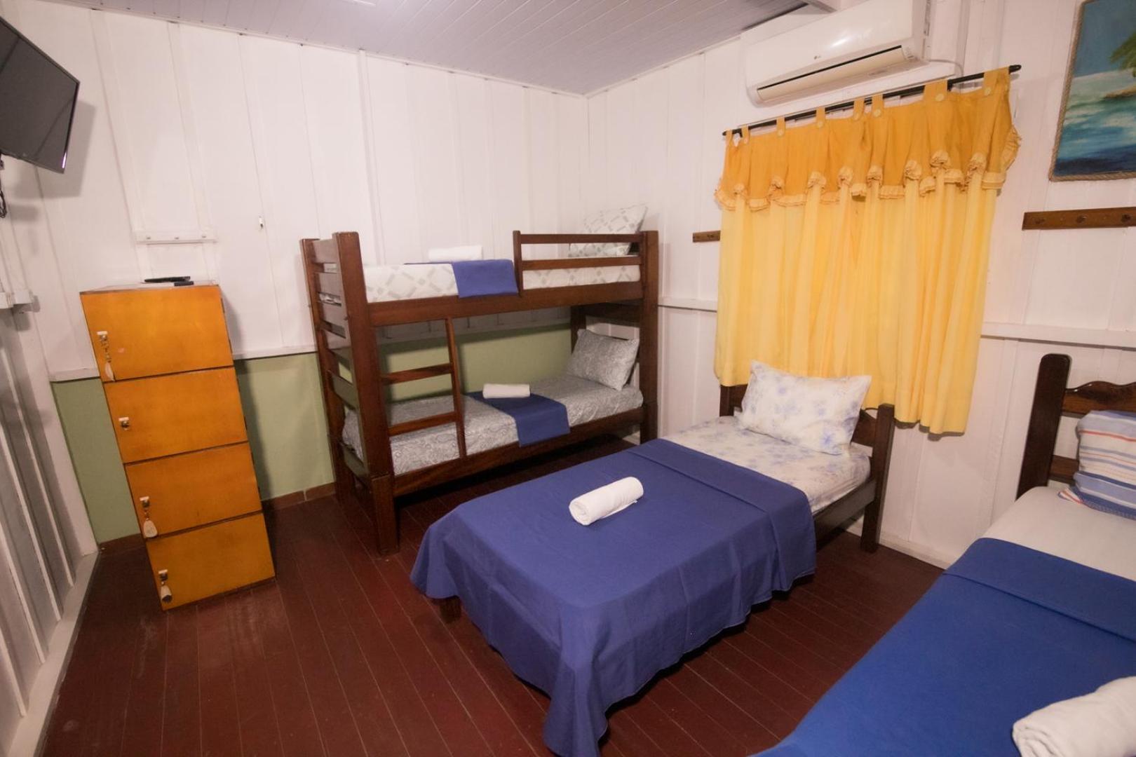 Single Bed In Male Dormitory Room photo 1