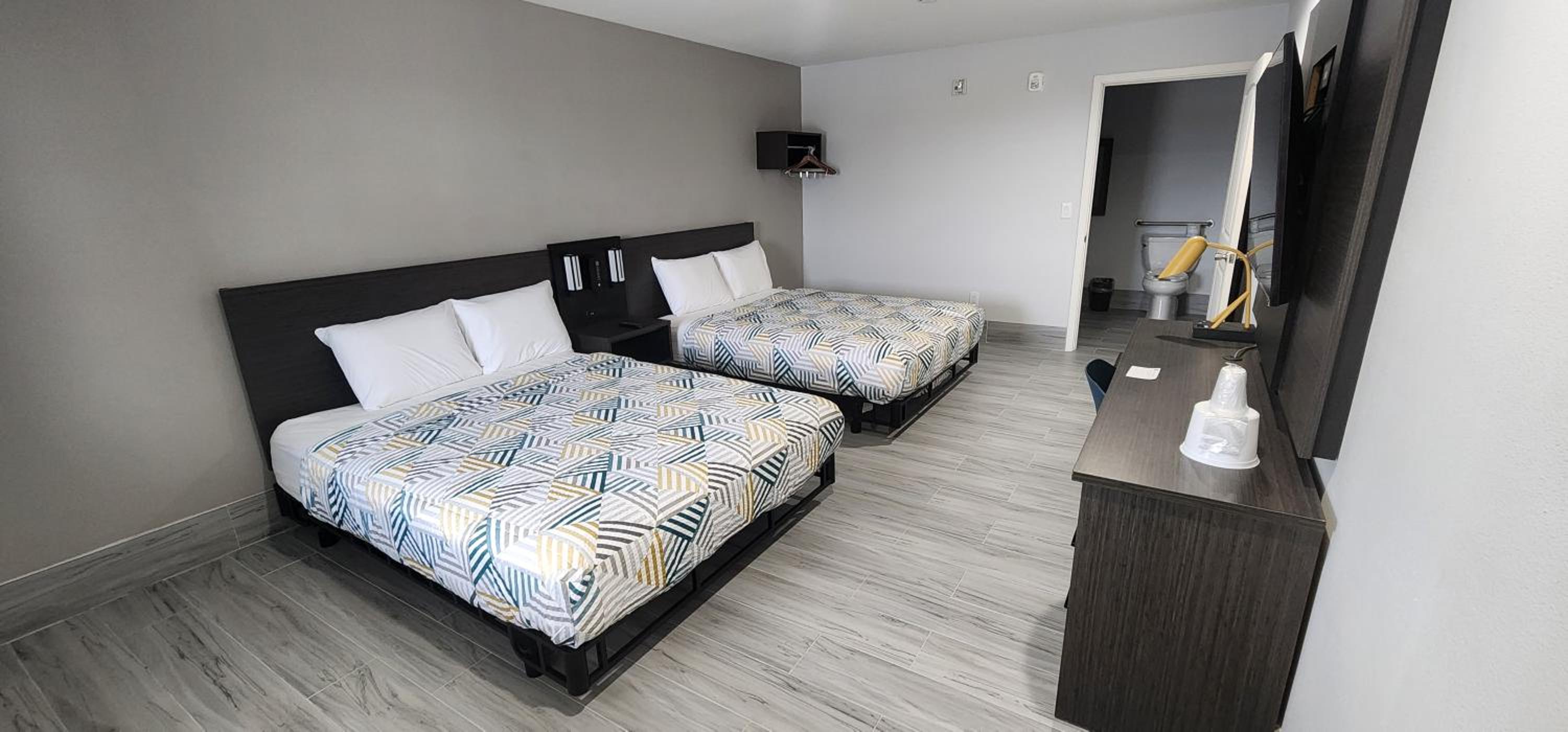 Queen Room with Two Queen Beds - Disability Access - Roll In Shower - Photo 1