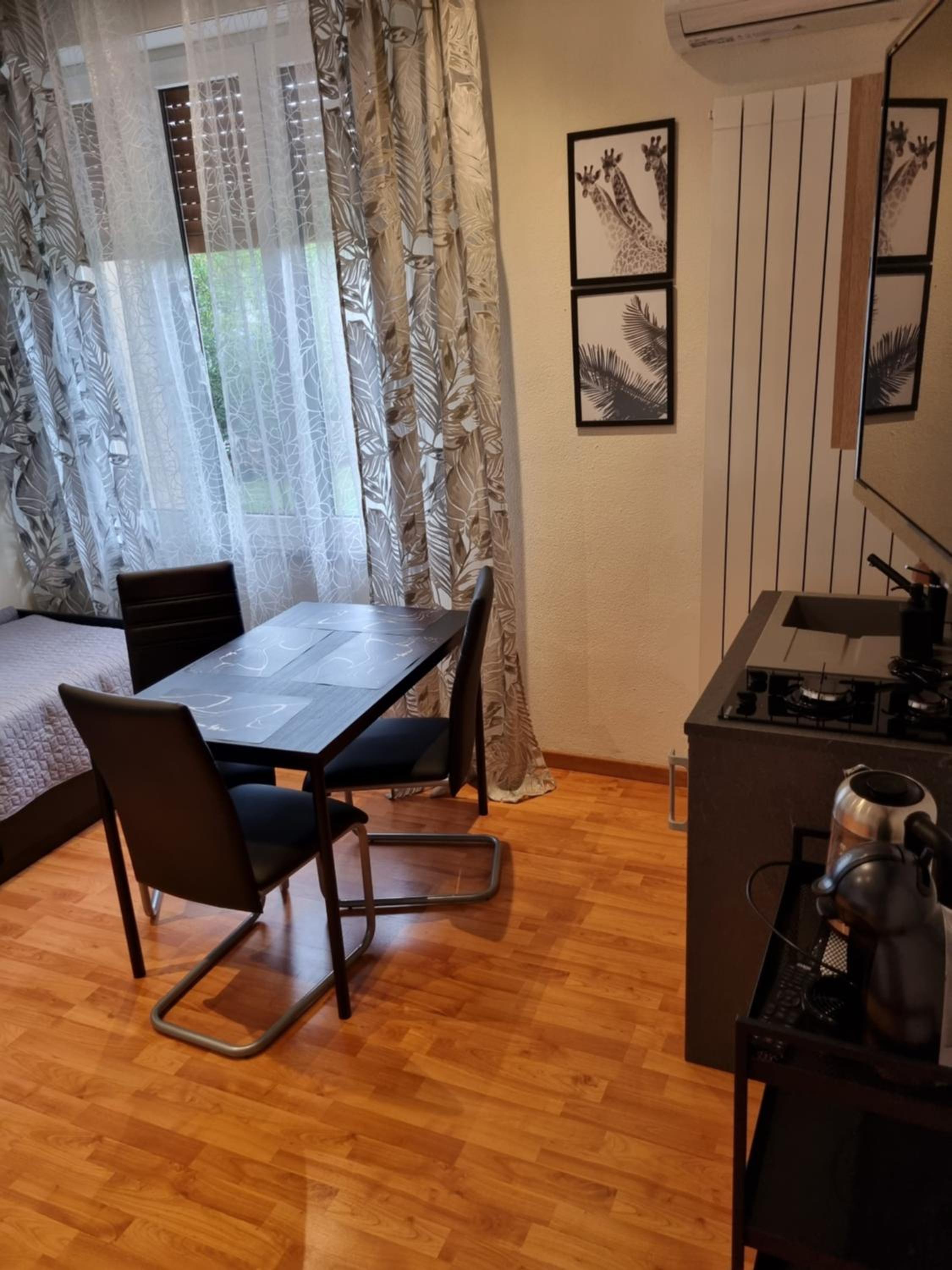 Three-Bedroom Apartment photo 2