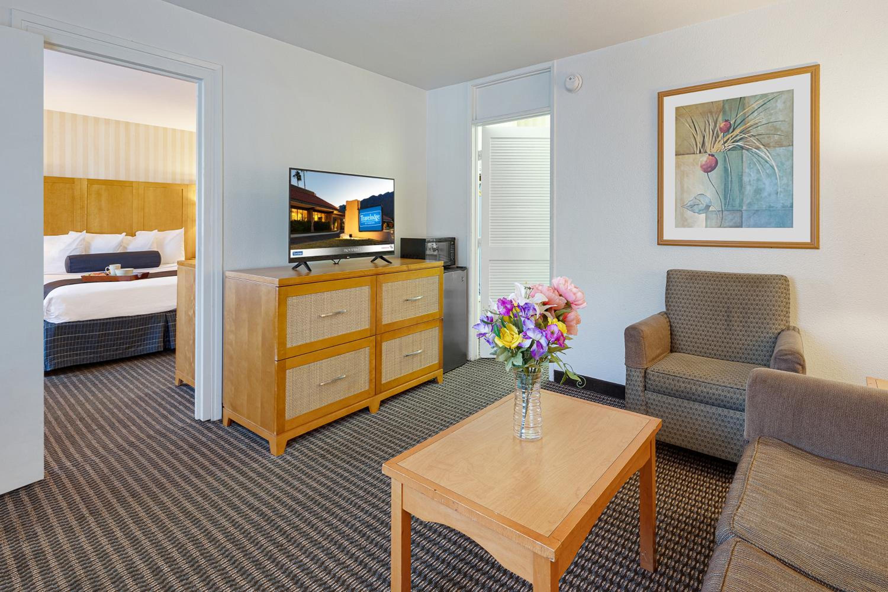 King Suite with One King and One Queen Bed - Non-Smoking - Photo 1