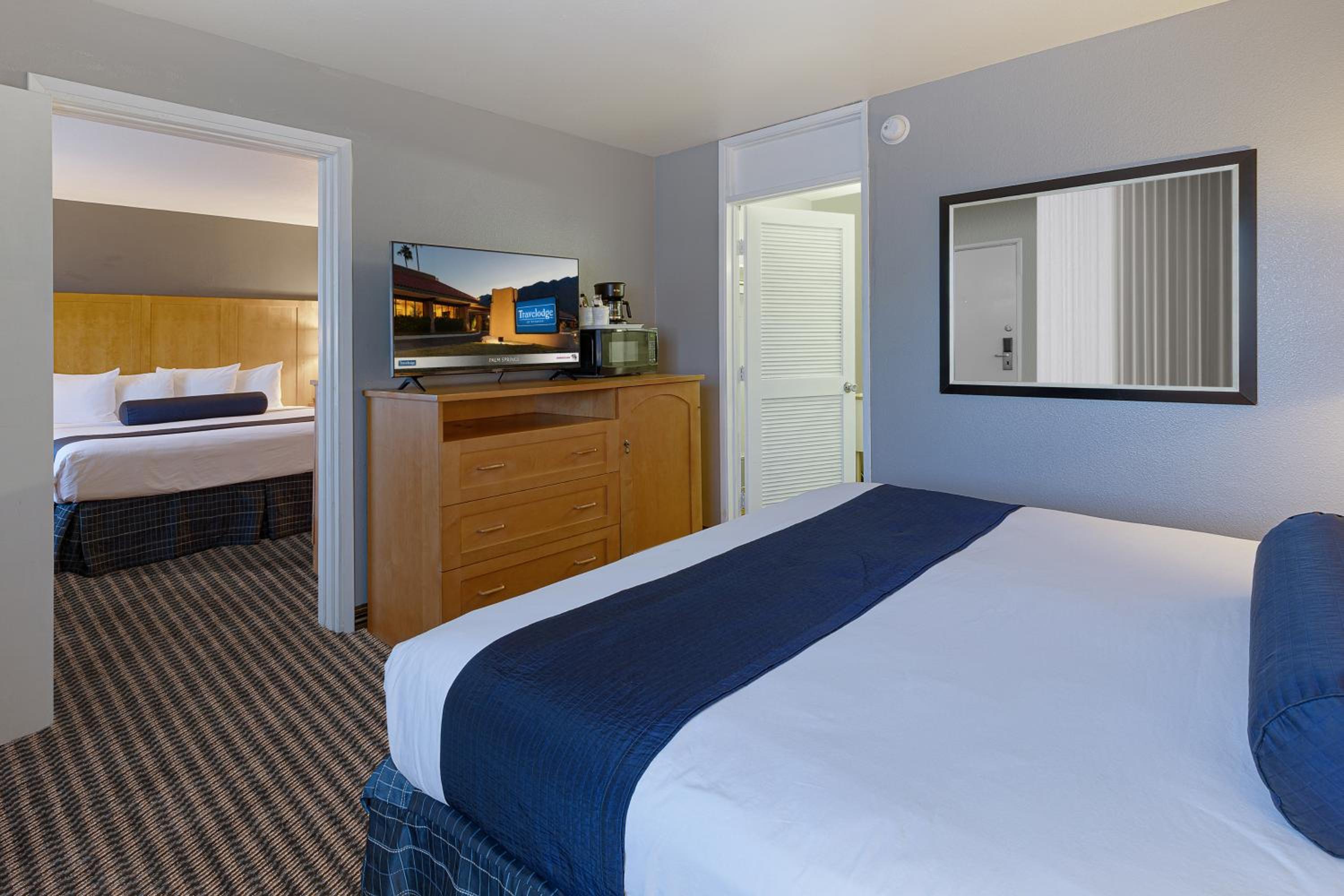 King Suite with One King and One Queen Bed - Non-Smoking - Photo 2