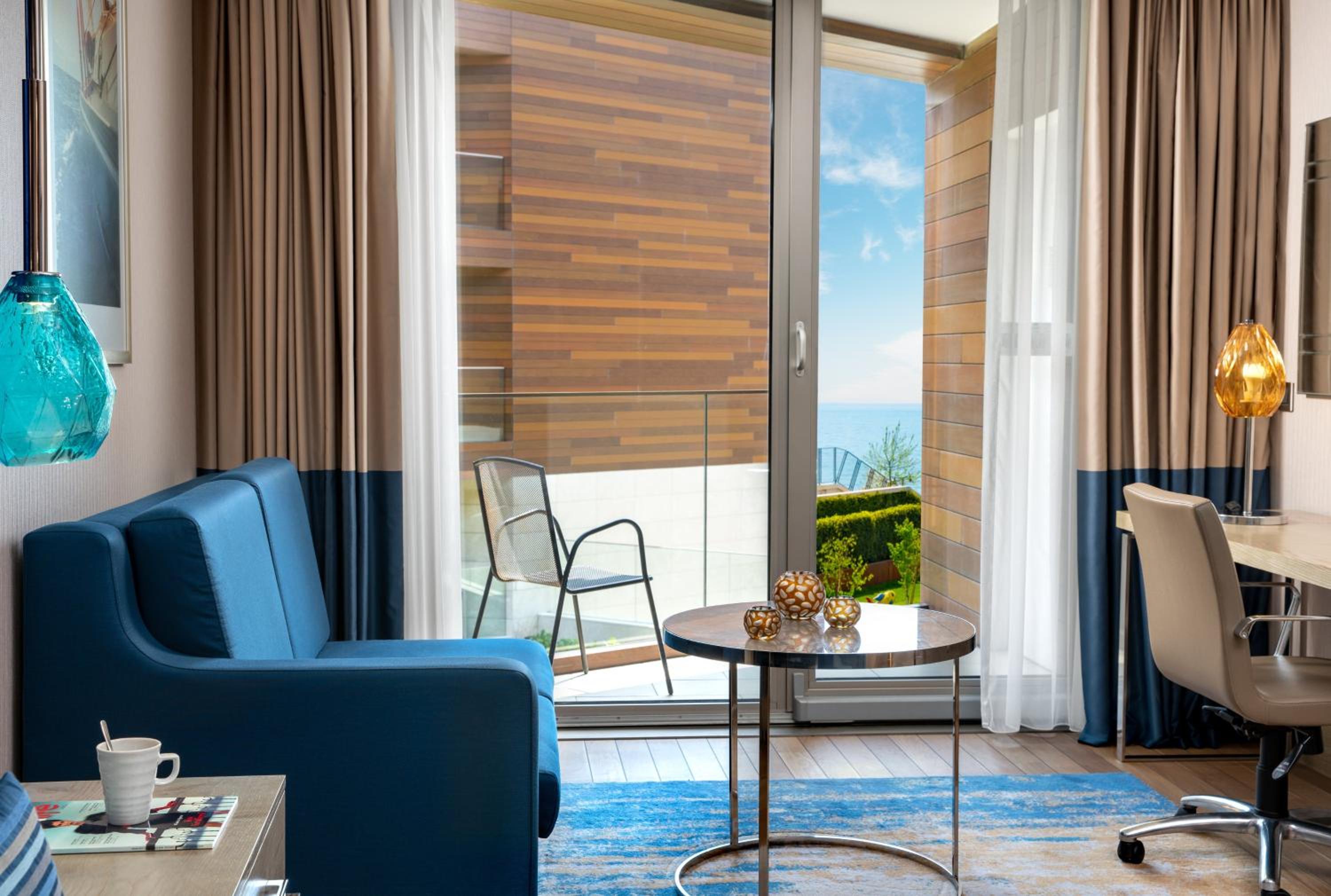 Premium Twin Room with Sofa Bed and Side Sea View