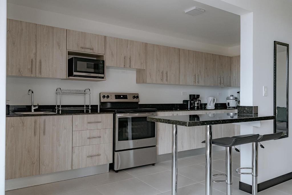 Three-Bedroom Apartment - Photo 15