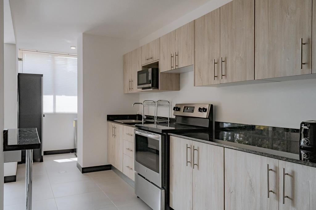 Three-Bedroom Apartment - Photo 8