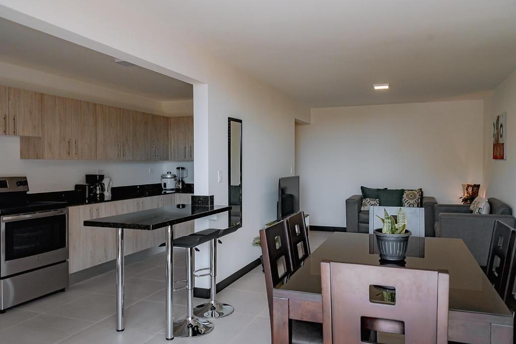 Three-Bedroom Apartment - Photo 32