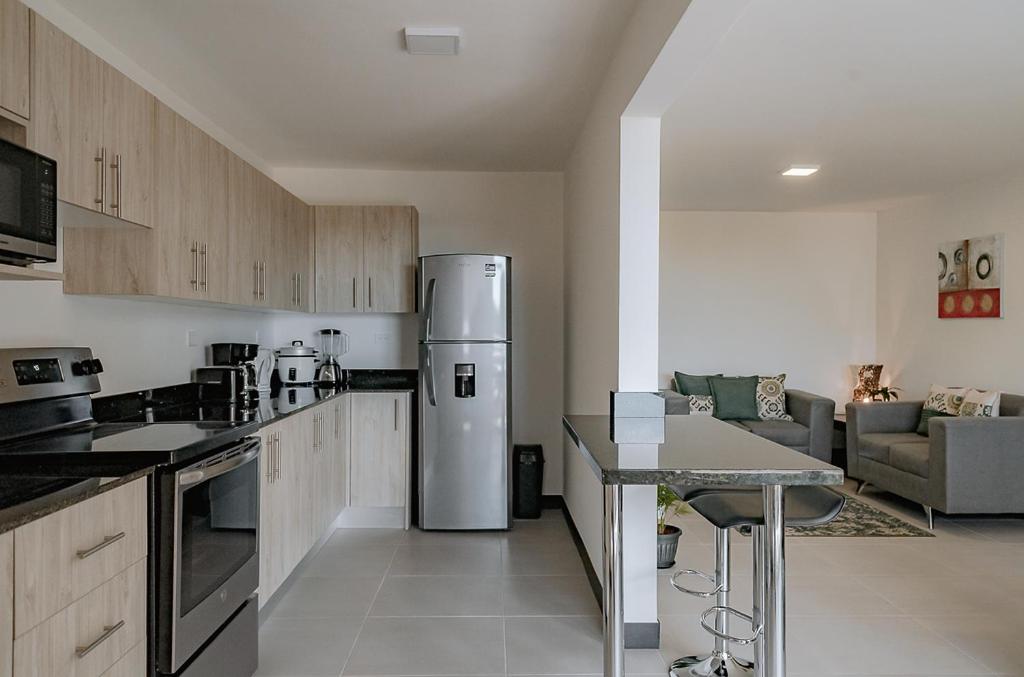 Three-Bedroom Apartment - Photo 11