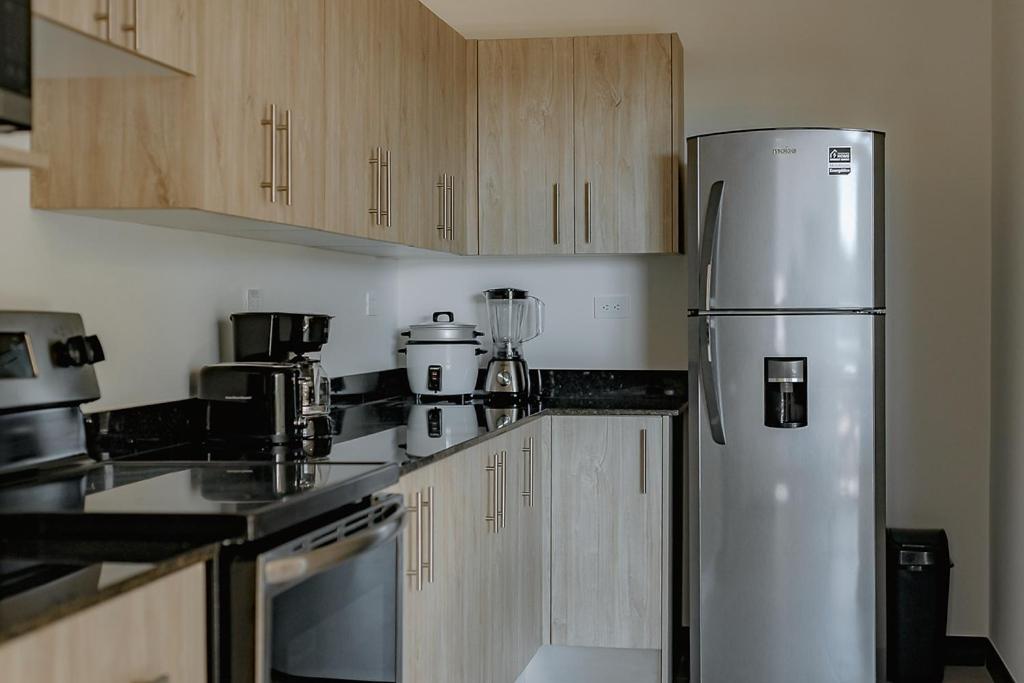 Three-Bedroom Apartment - Photo 26