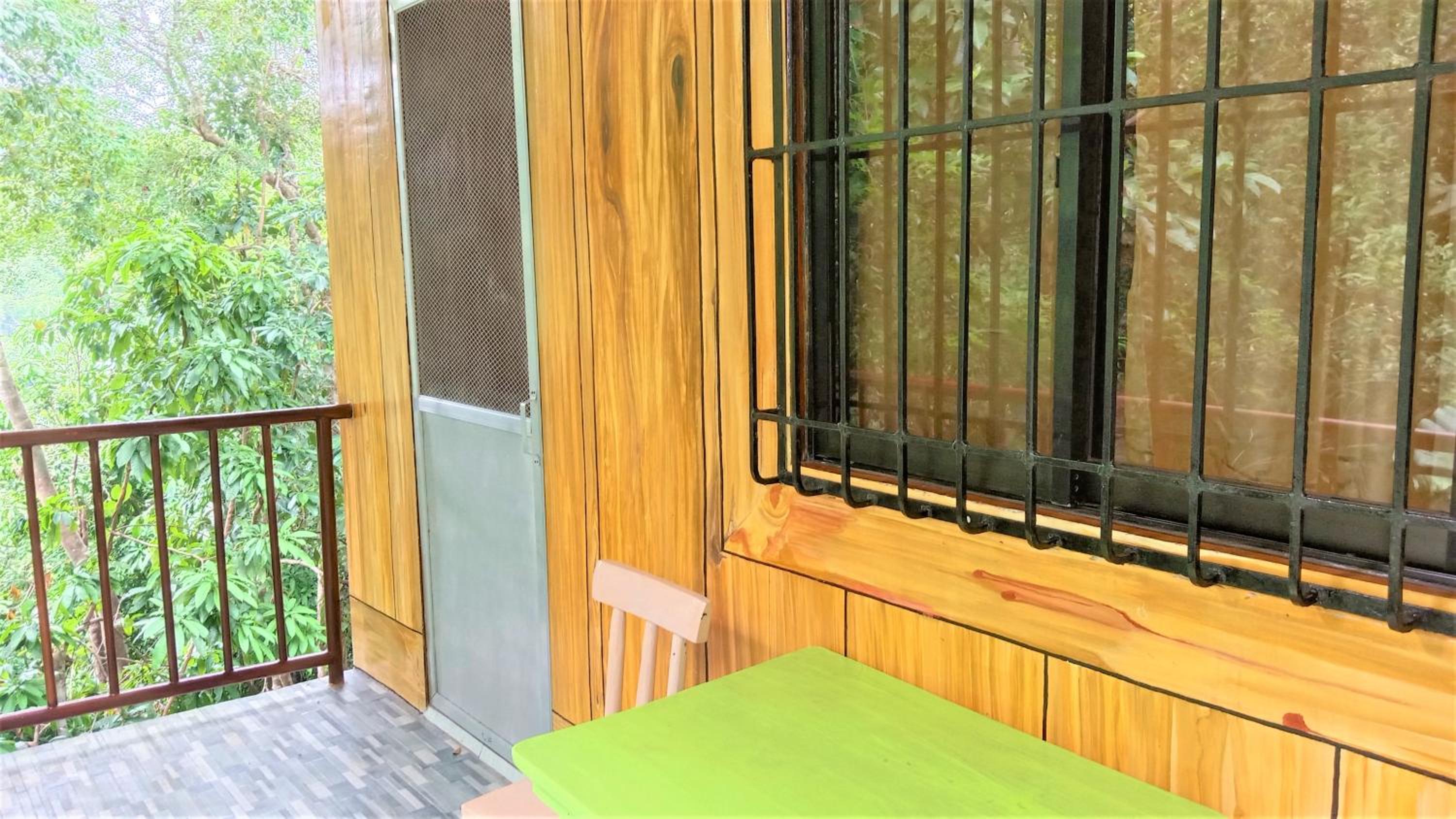 Family Room with Balcony - Photo 7