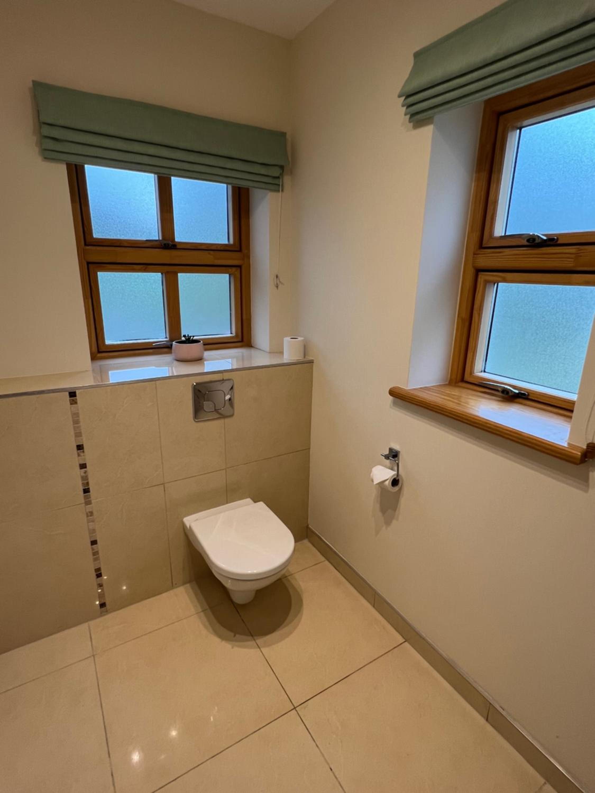 Two-Bedroom House - Photo 40