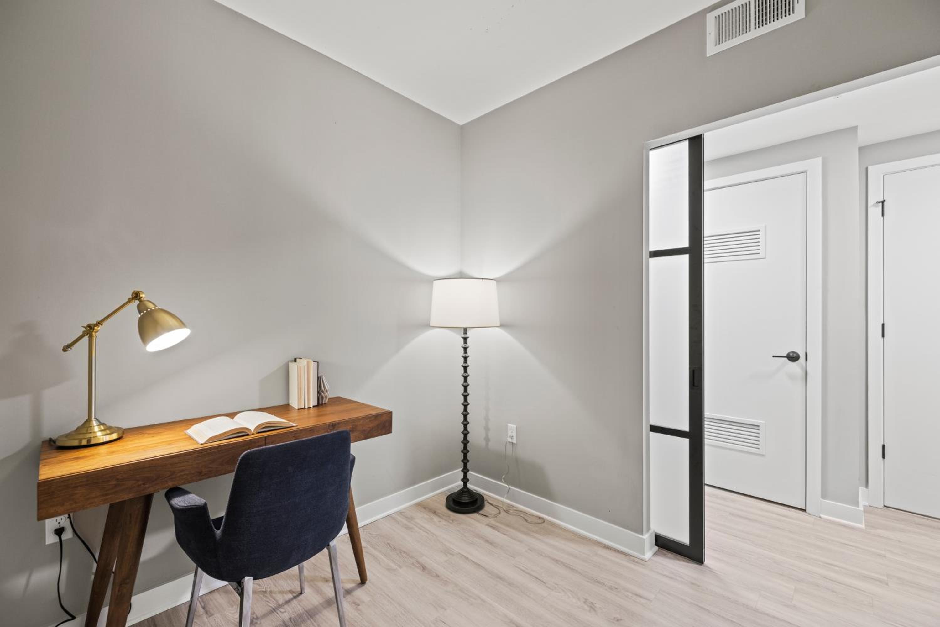 Premium One Bedroom Apartment with Den - Photo 2