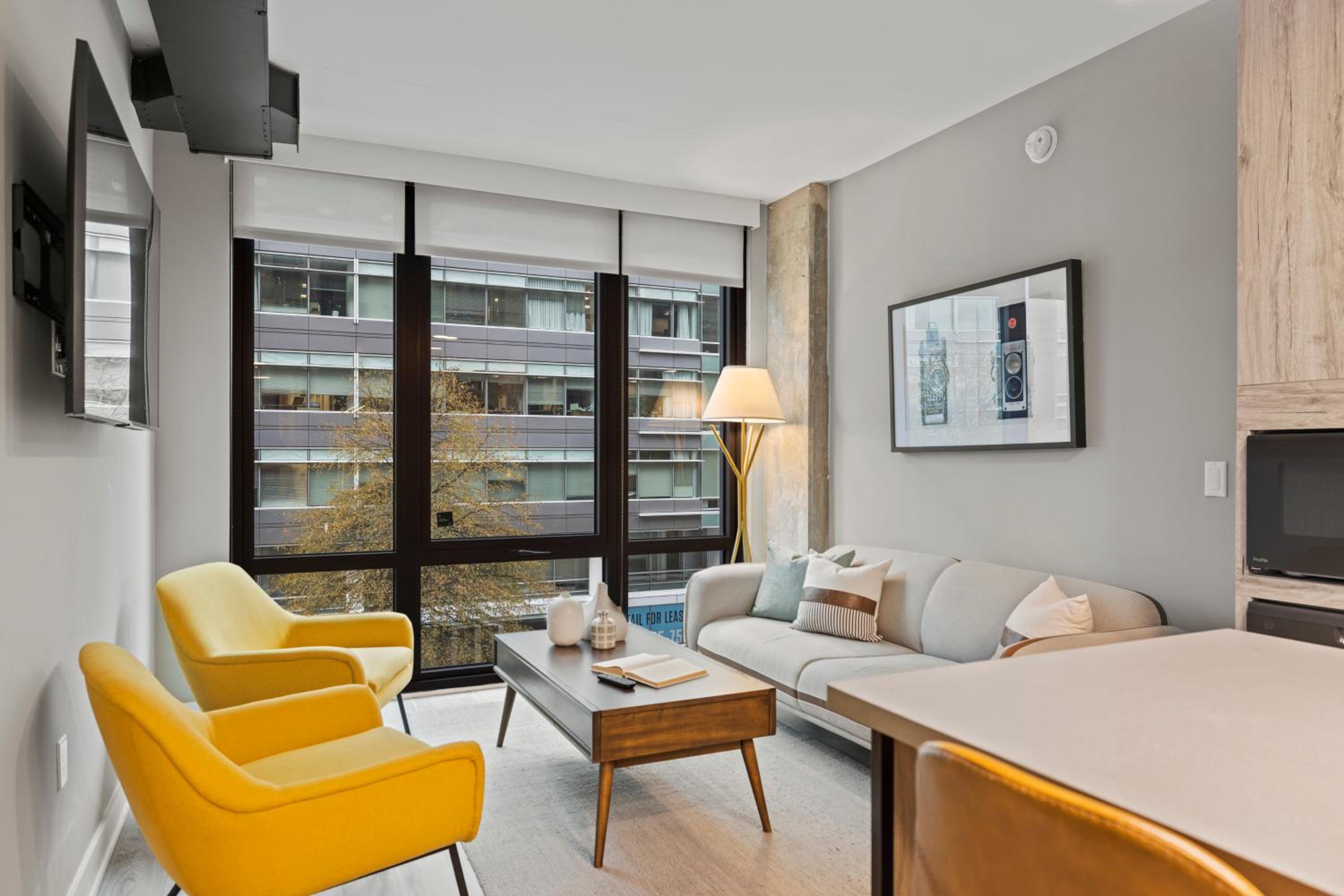 Premium One Bedroom Apartment with Den - Photo 1