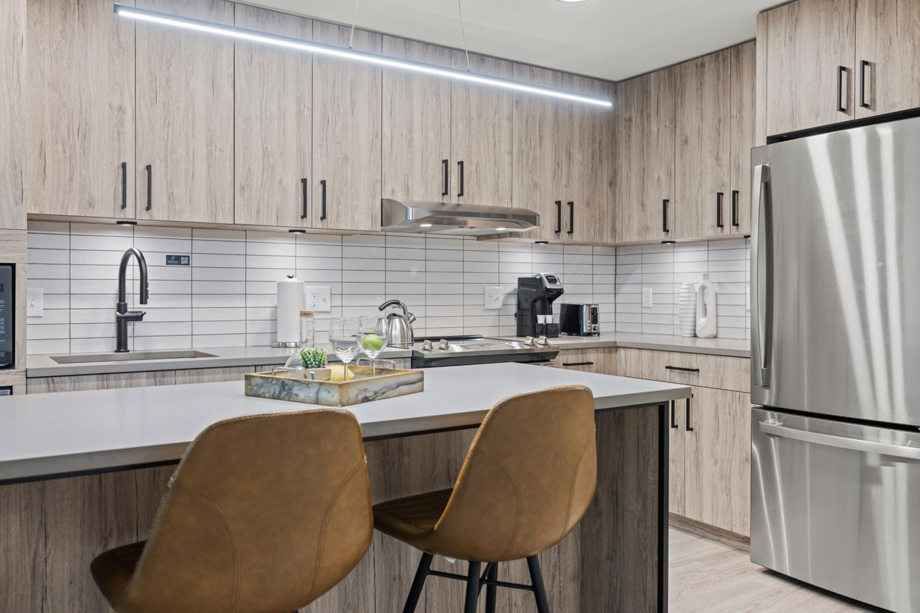Premium One Bedroom Apartment with Den - Photo 6