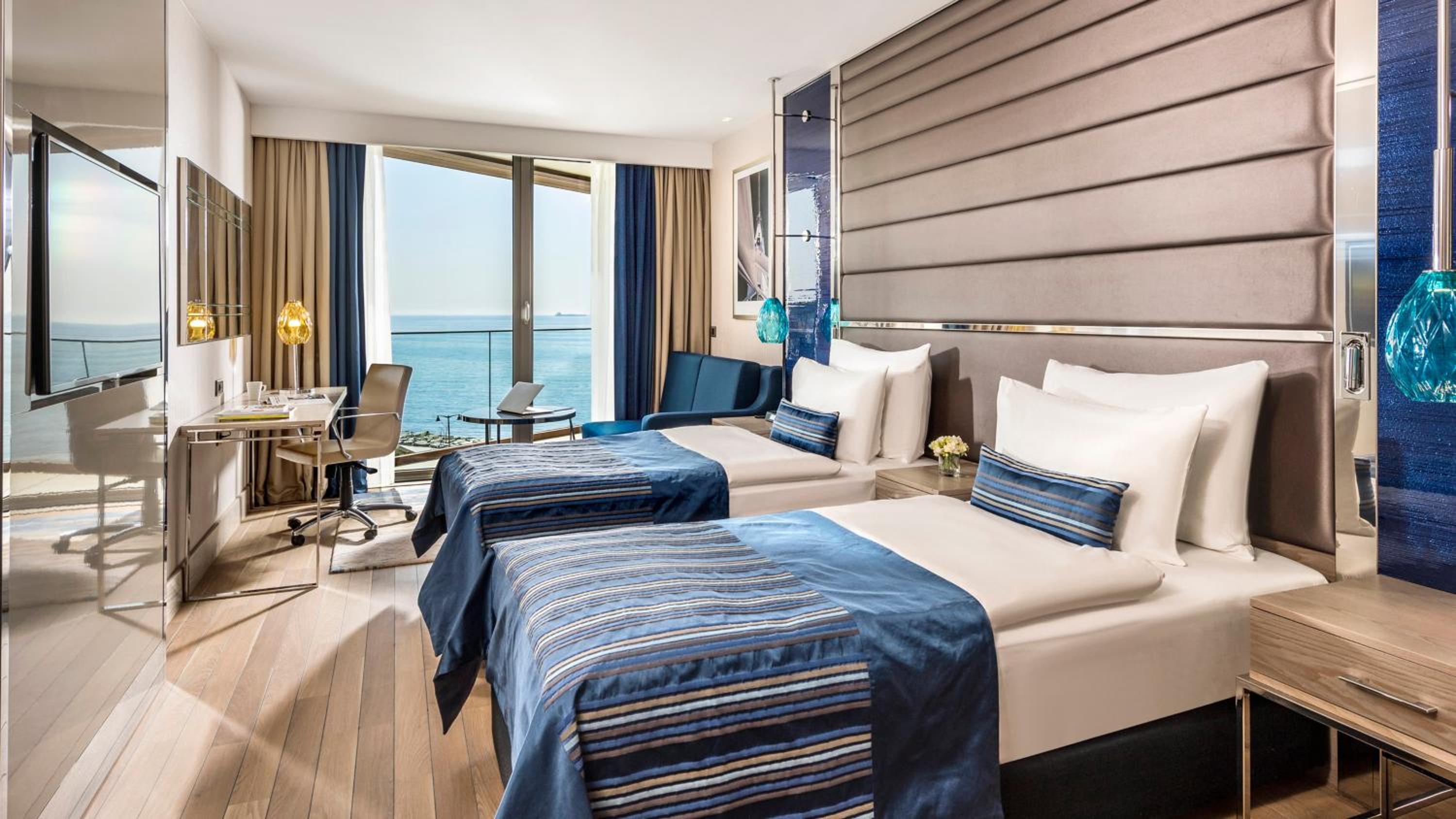 Premium Twin Room with Sofa Bed and Side Sea View