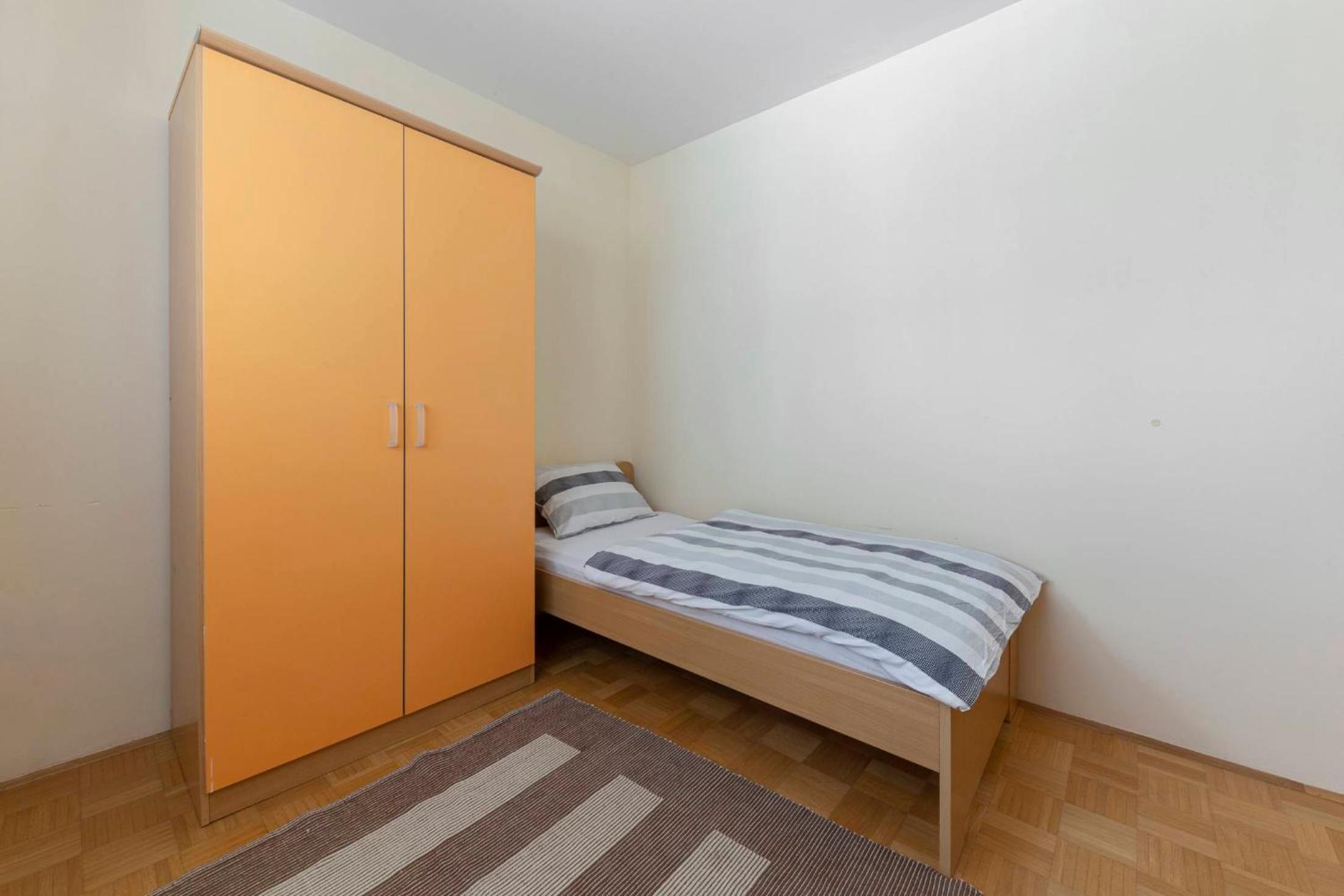 Four-Bedroom Apartment with Balcony photo 3