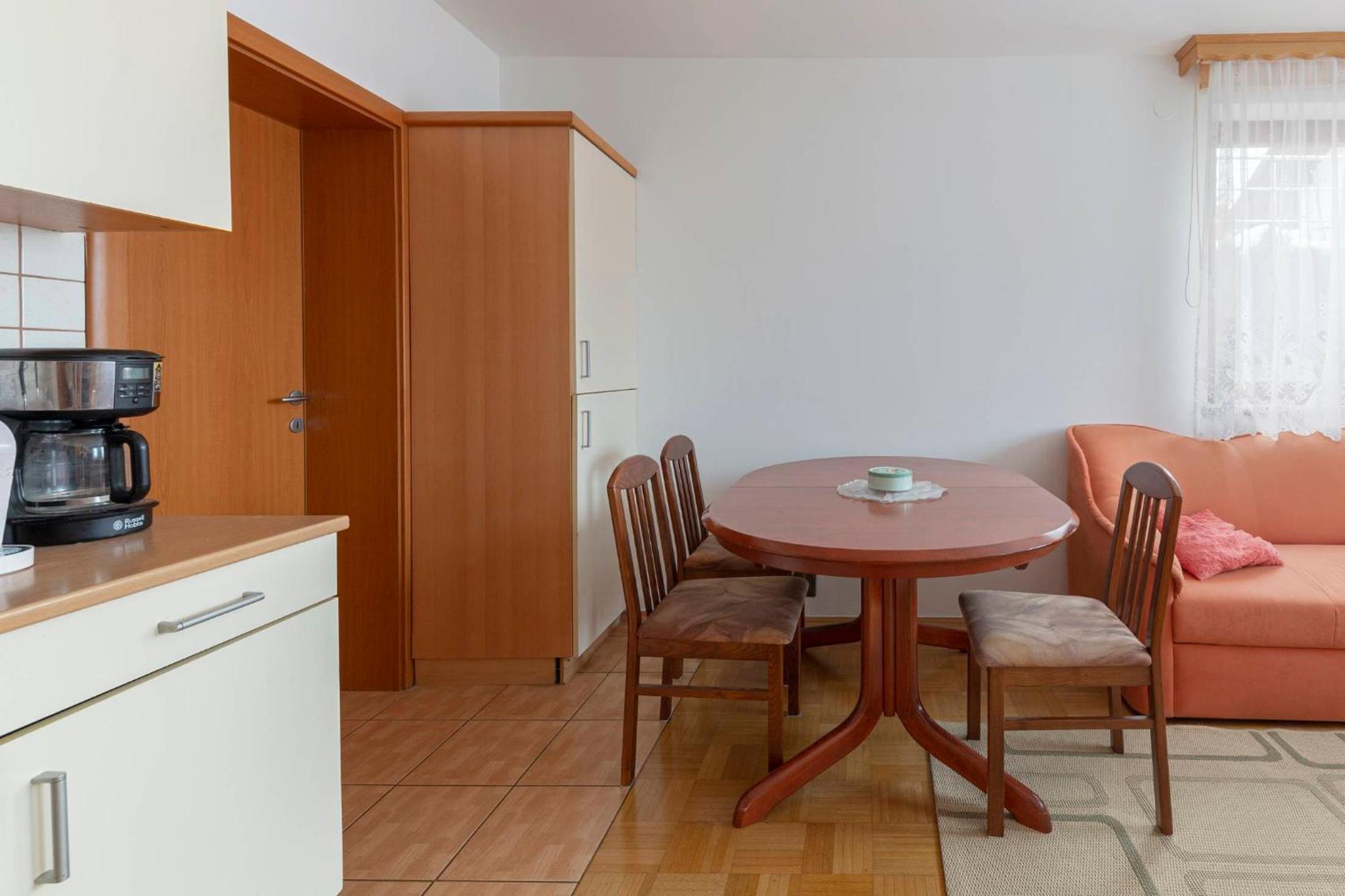 Four-Bedroom Apartment with Balcony photo 2