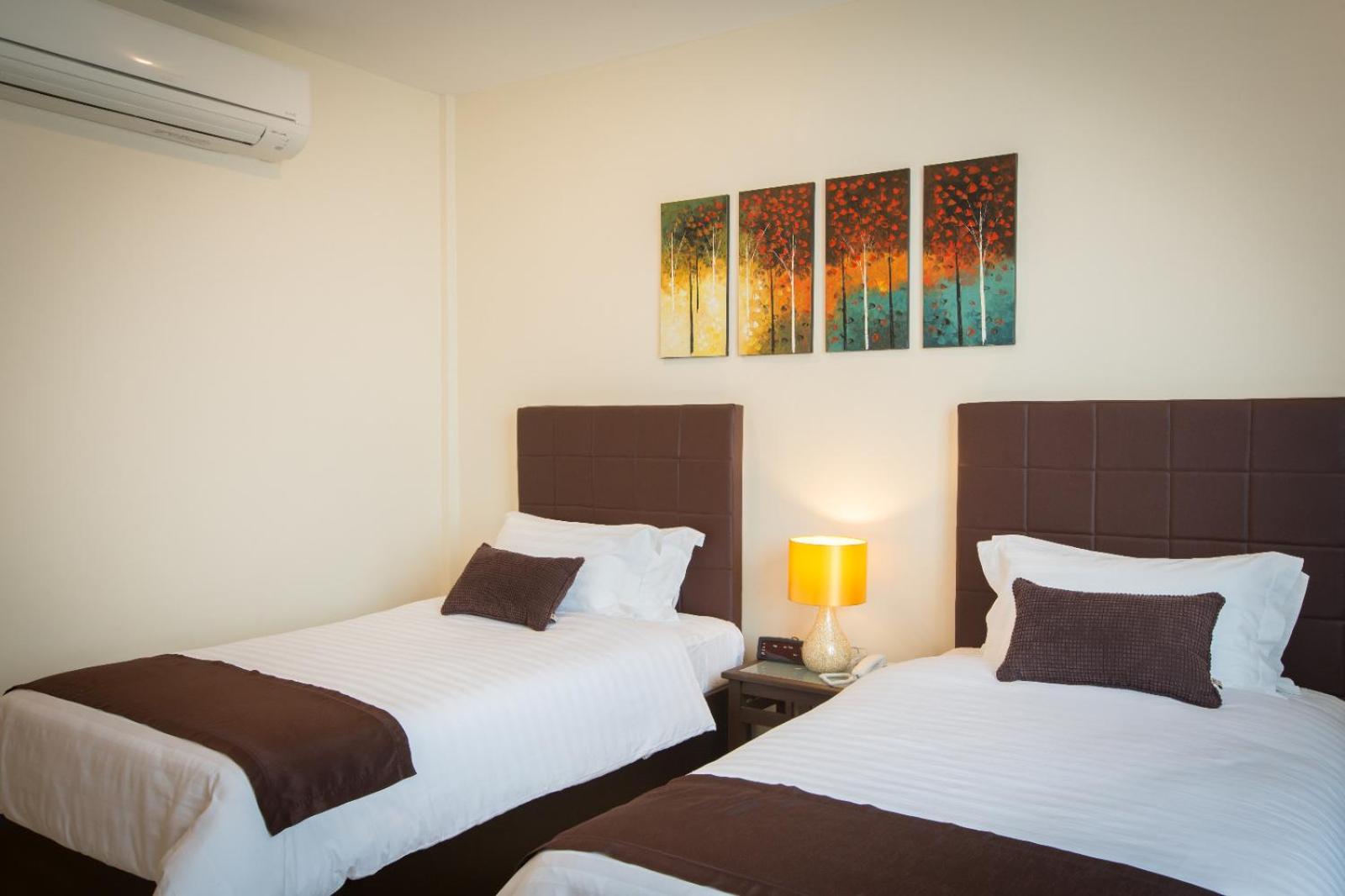 Standard Twin Room - Photo 4