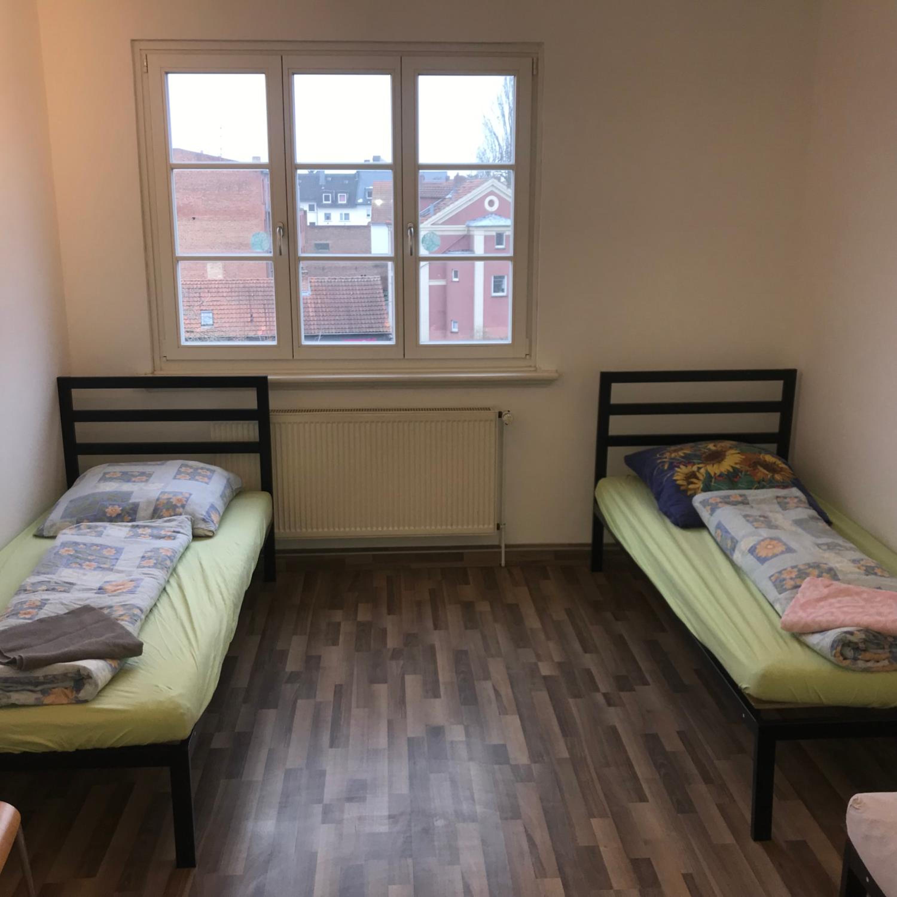 Basic Triple Room with Shared Bathroom