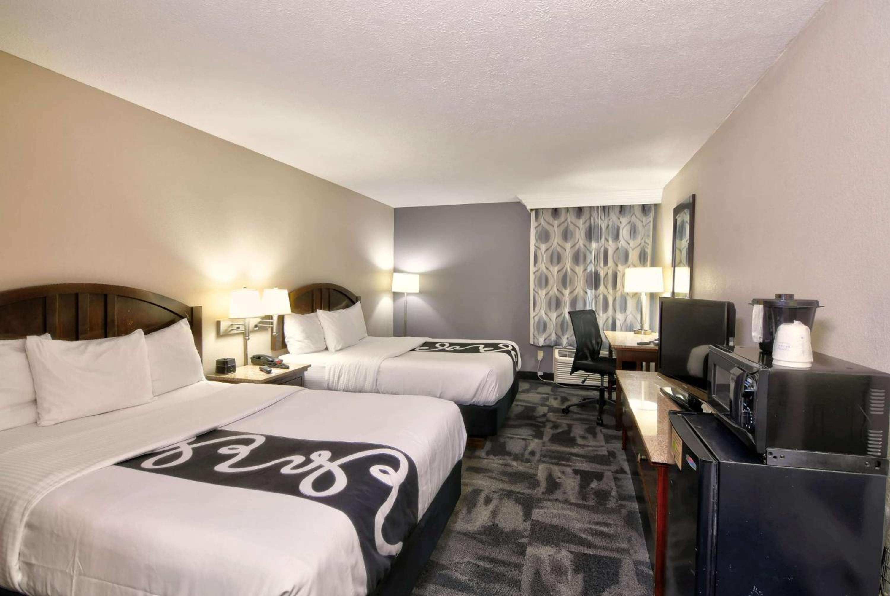 Queen Room with Two Queen Beds - Photo 1