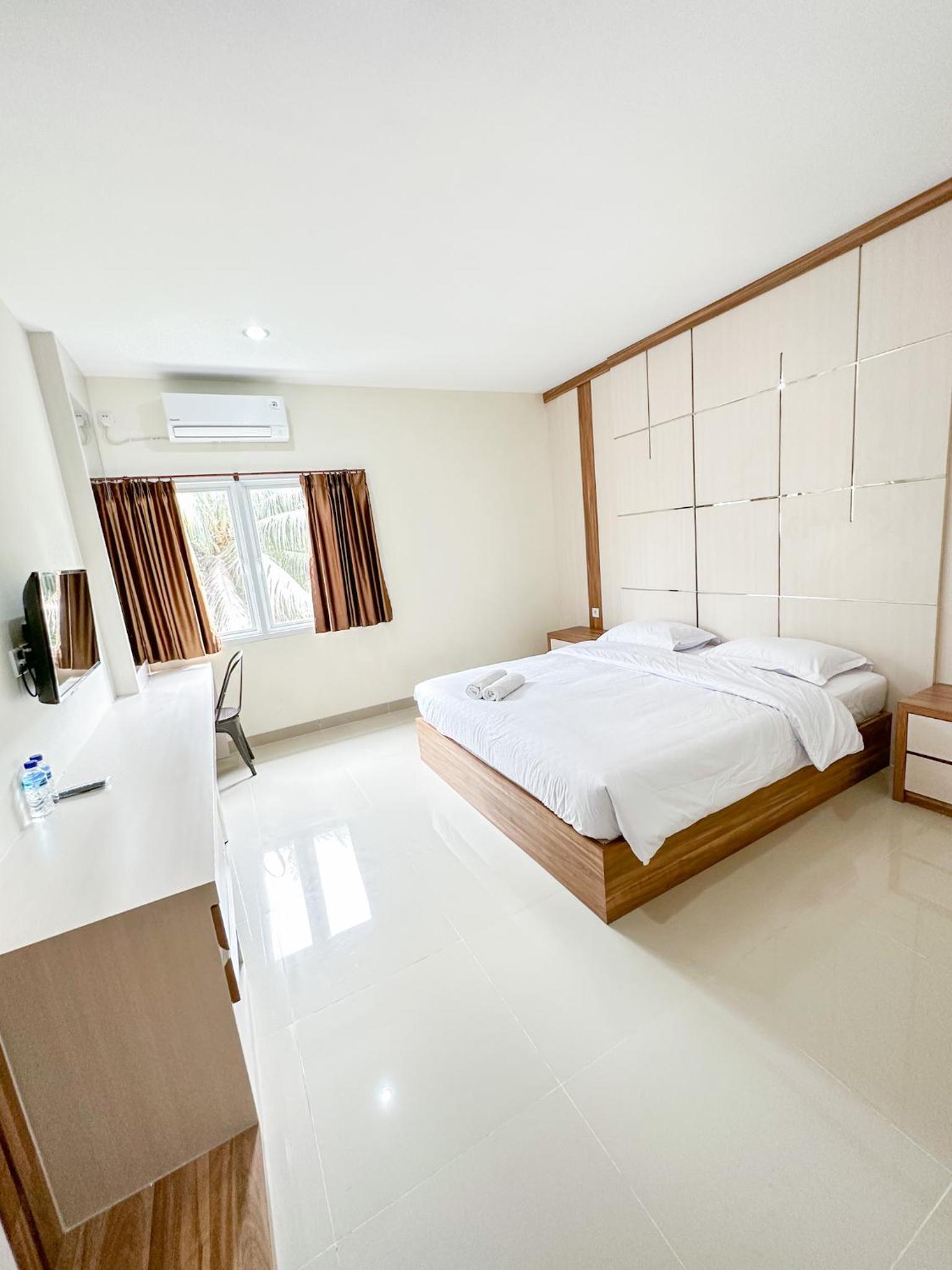 Deluxe King Room - Photo 5