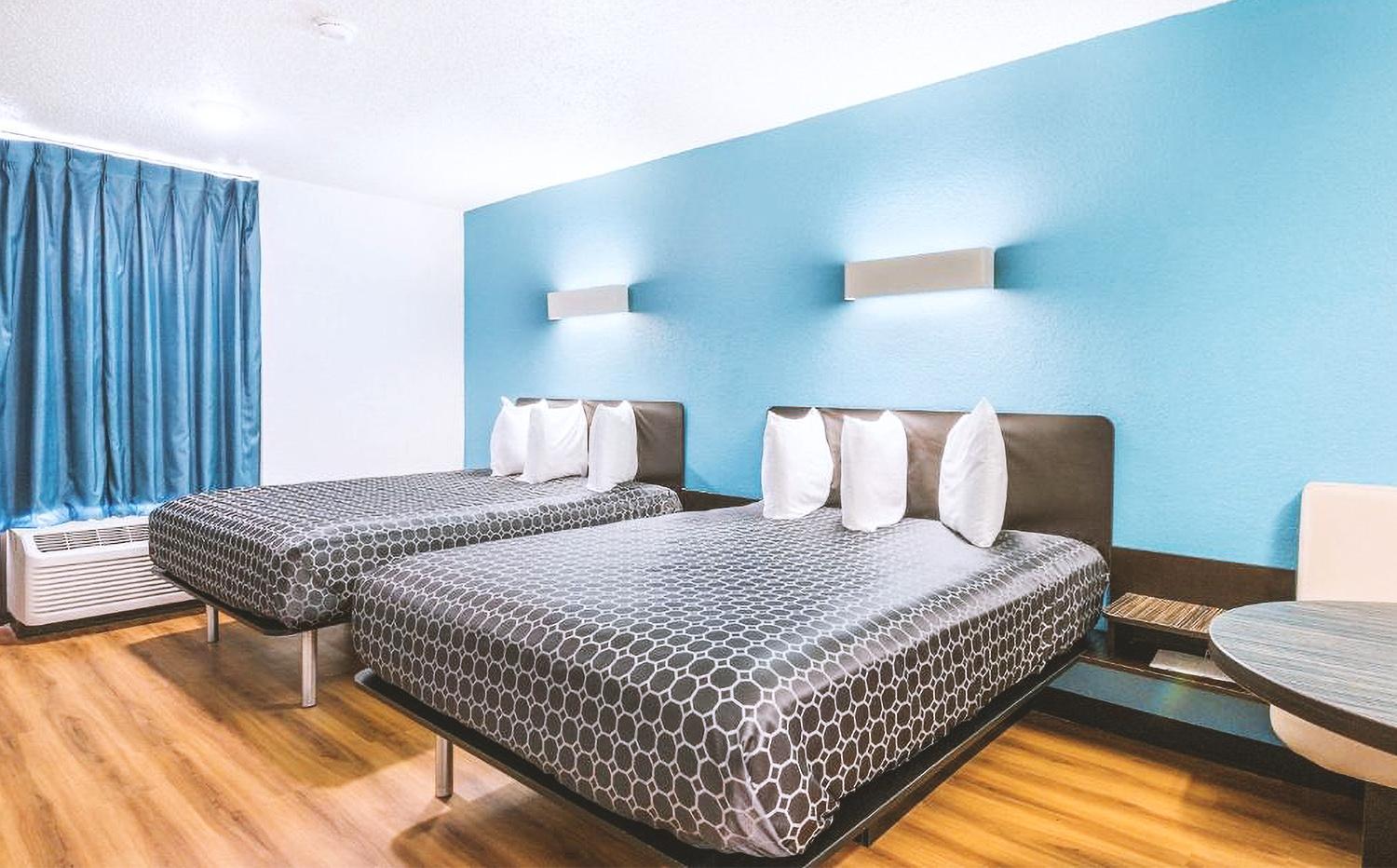 Deluxe Queen Room With Two Queen Beds photo 2