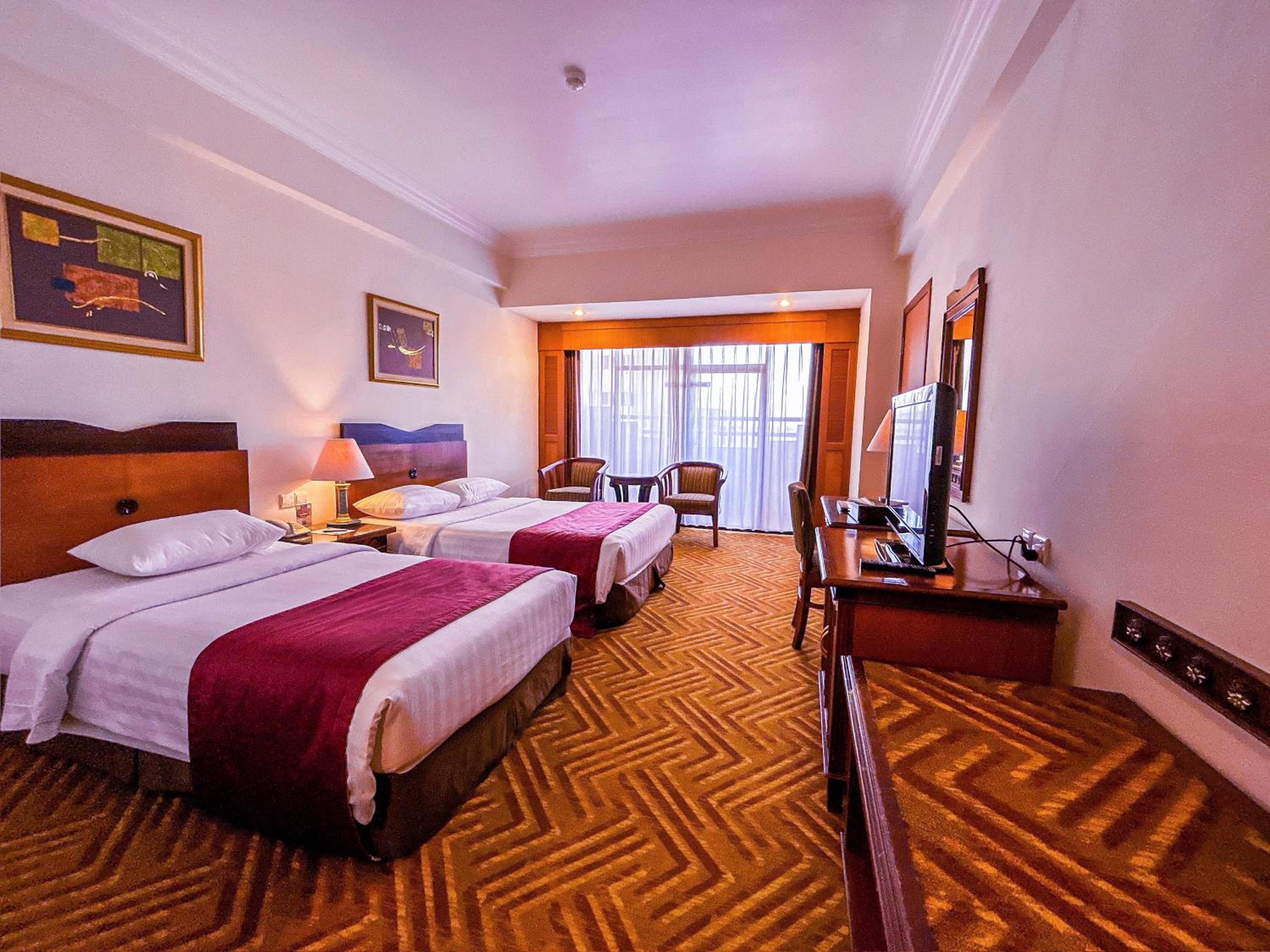 Deluxe Triple Room