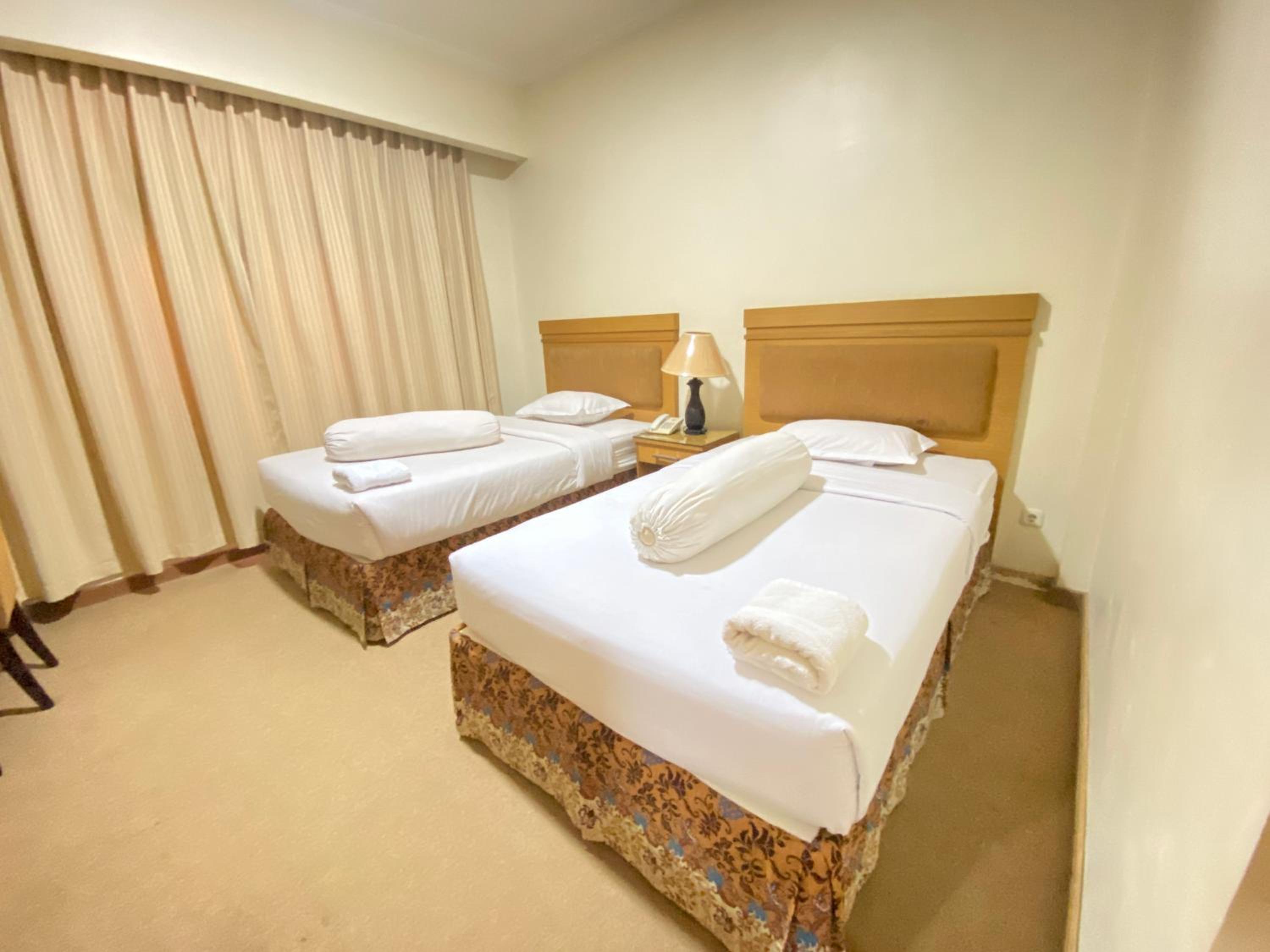 Deluxe Room - Photo 15