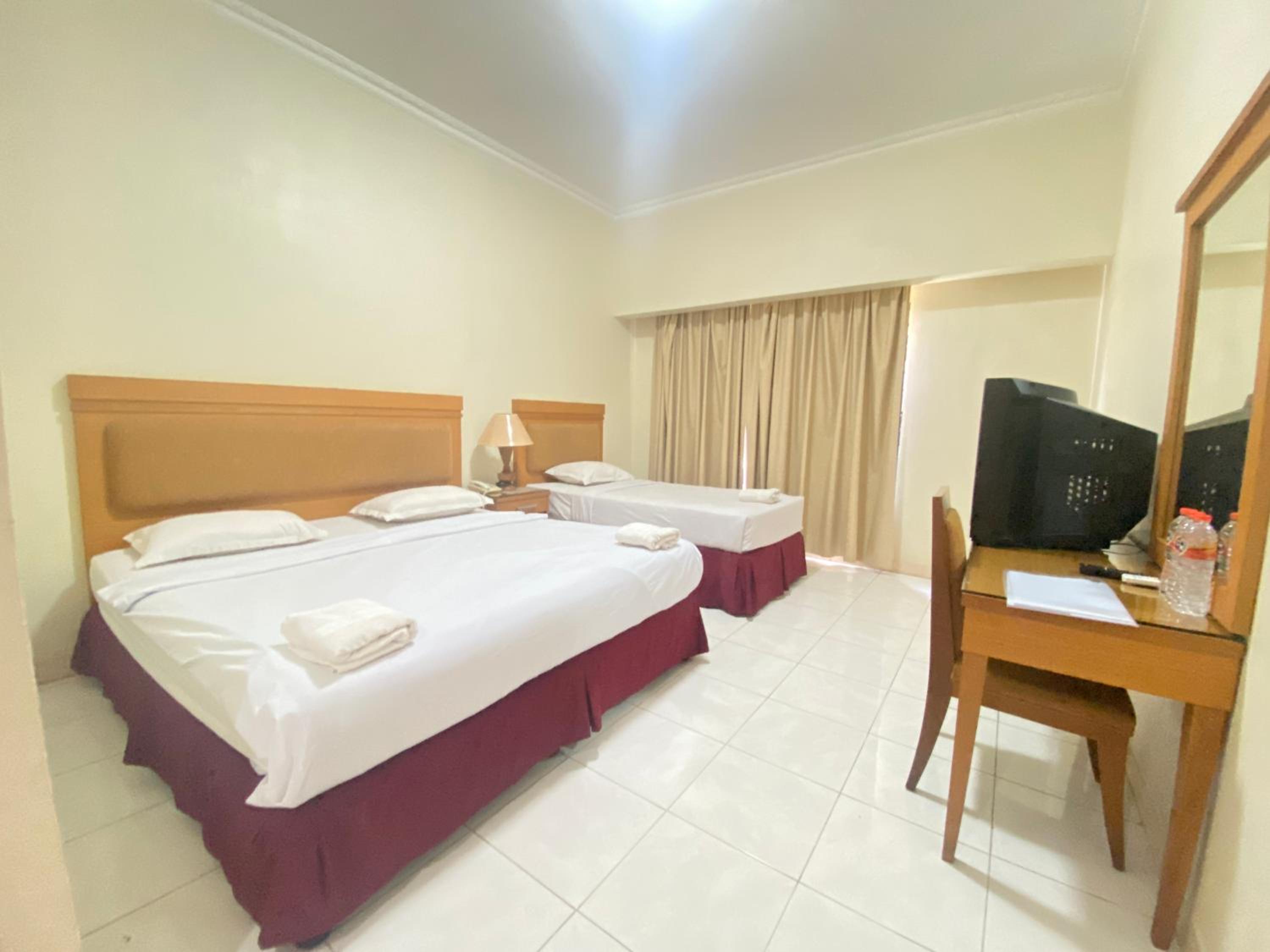 Triple Room - Photo 12