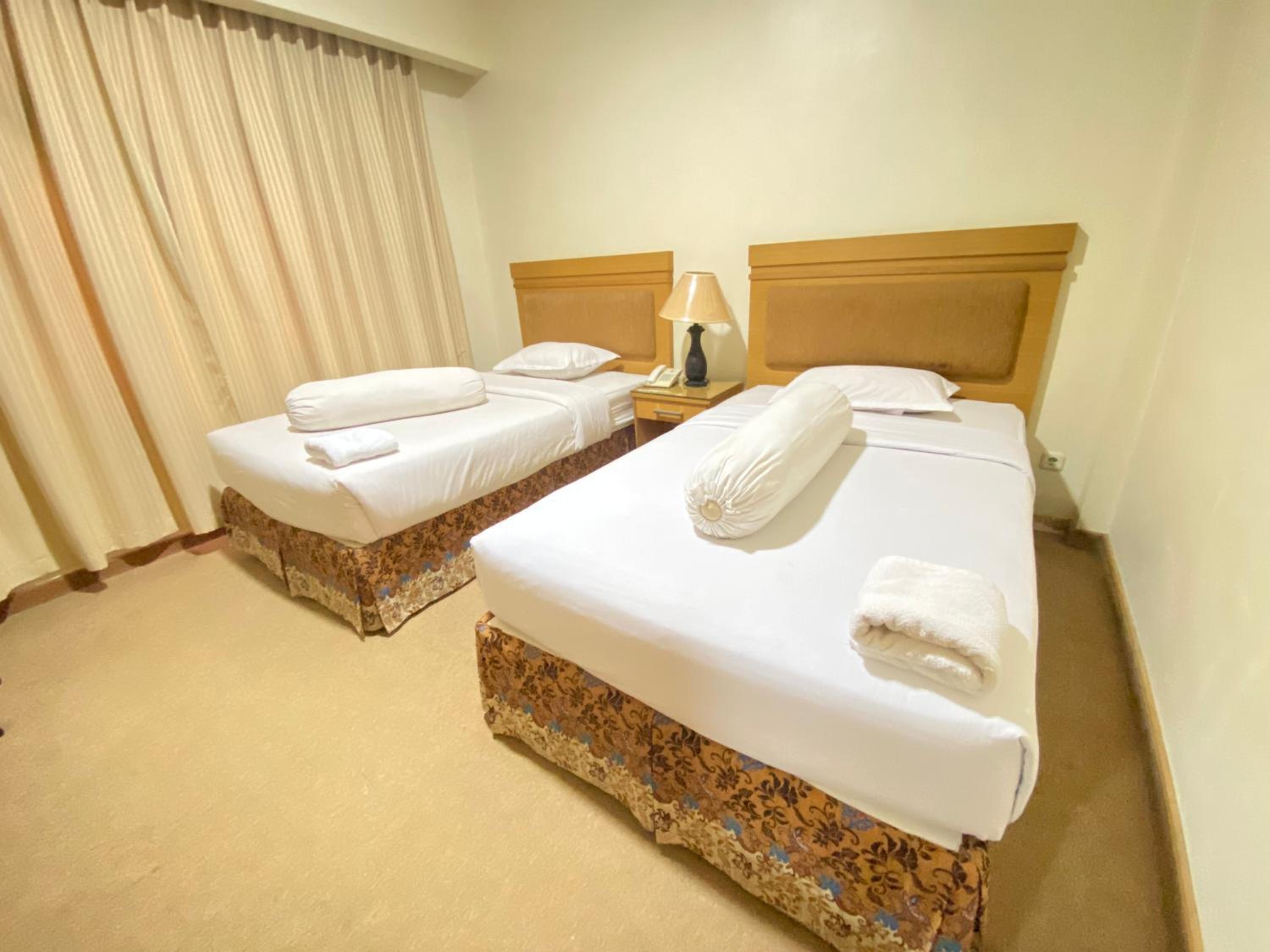 Deluxe Room - Photo 12