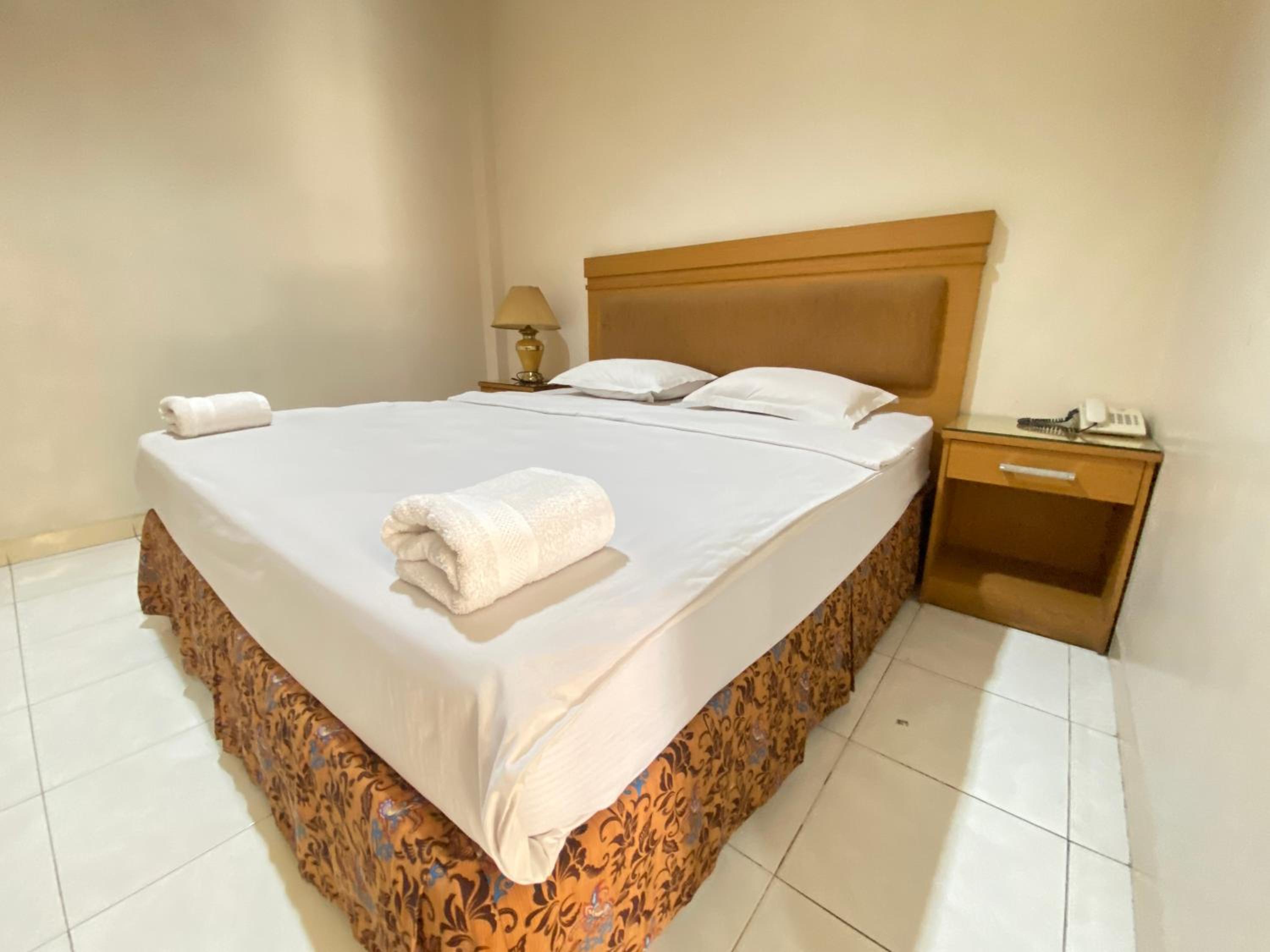 Deluxe Room - Photo 11