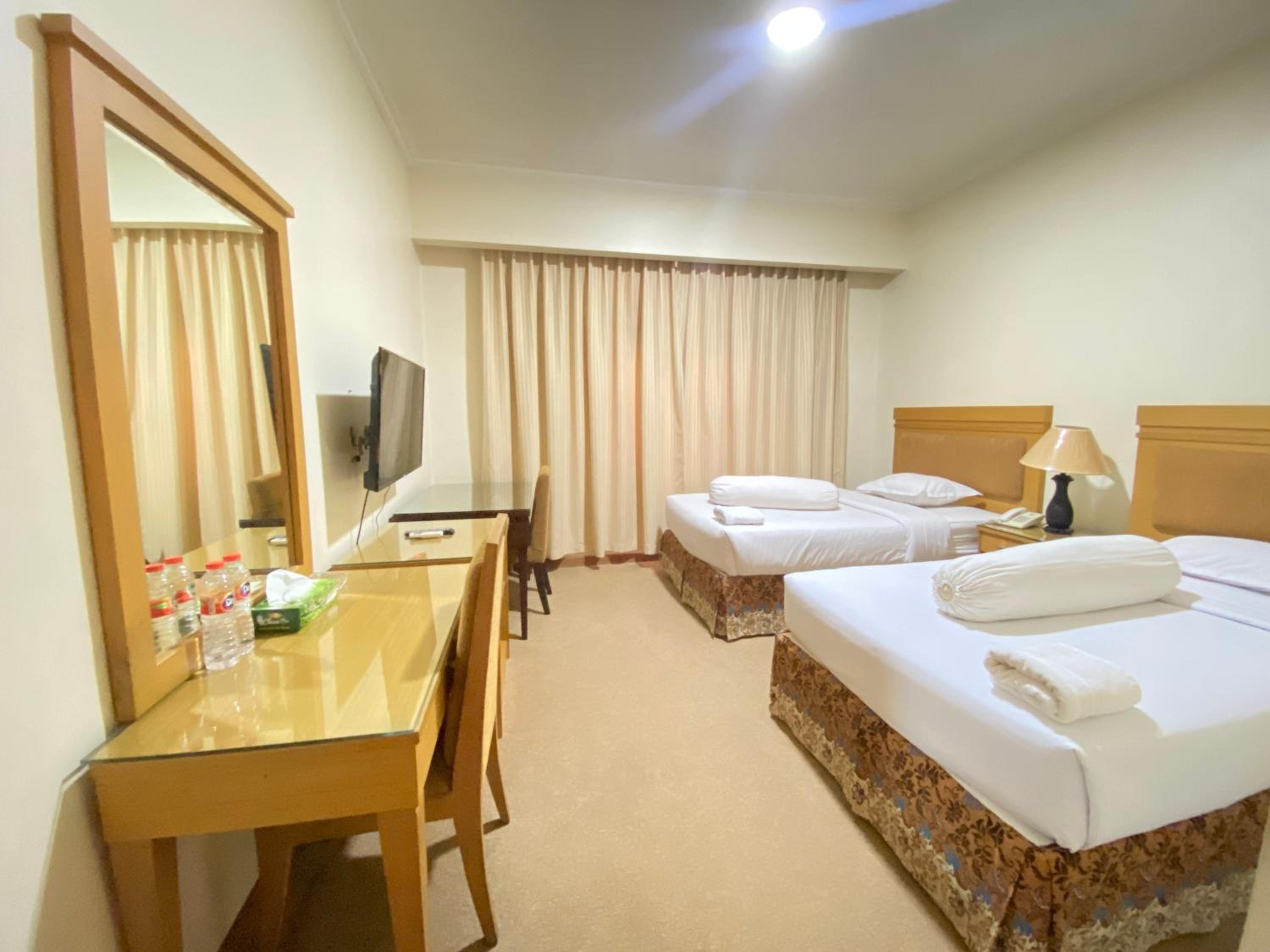 Deluxe Room - Photo 10
