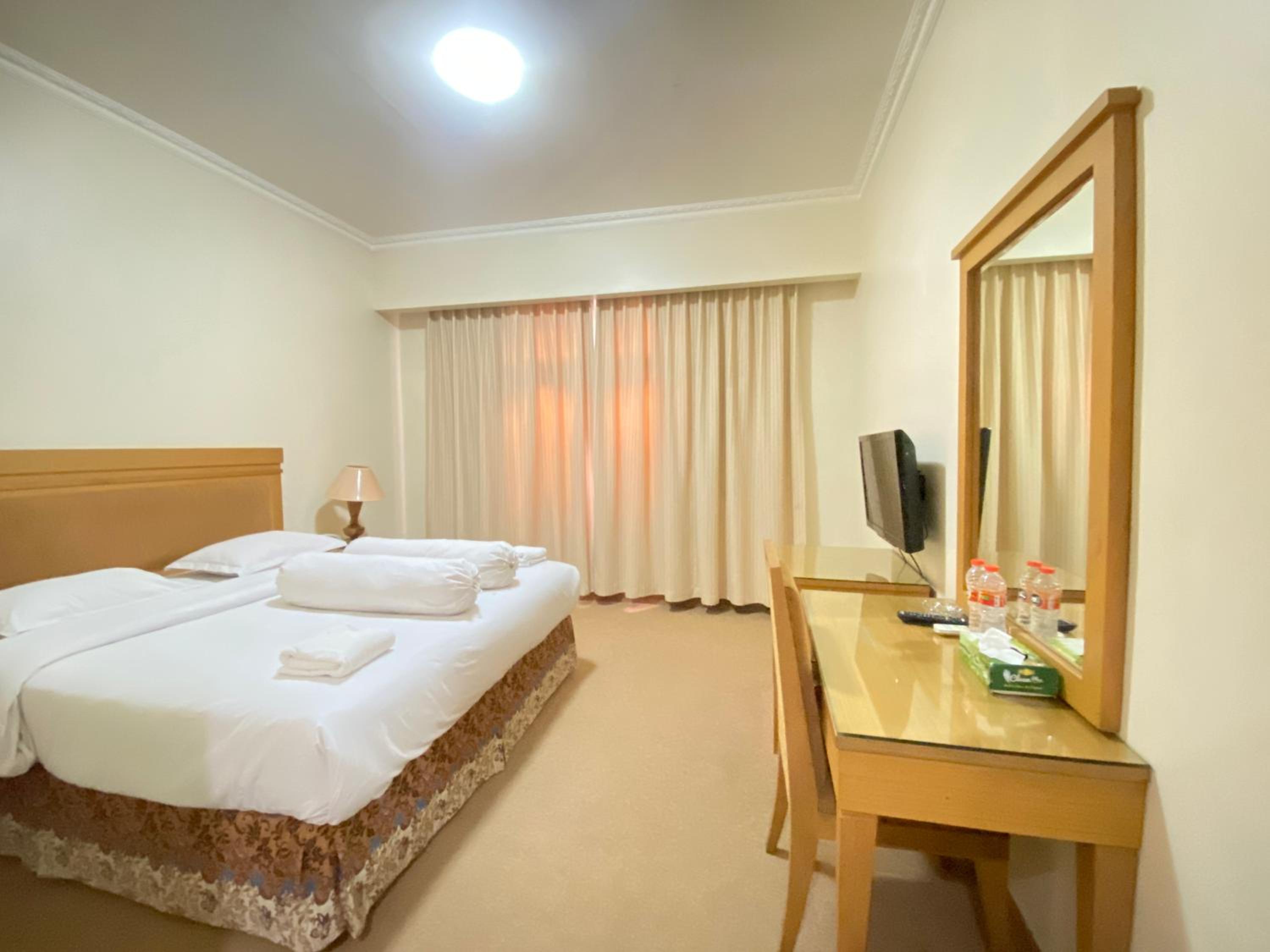 Deluxe Room - Photo 5