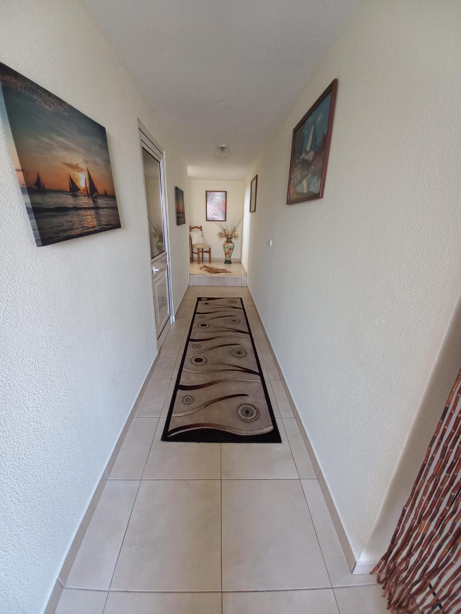 Three-Bedroom House photo 1