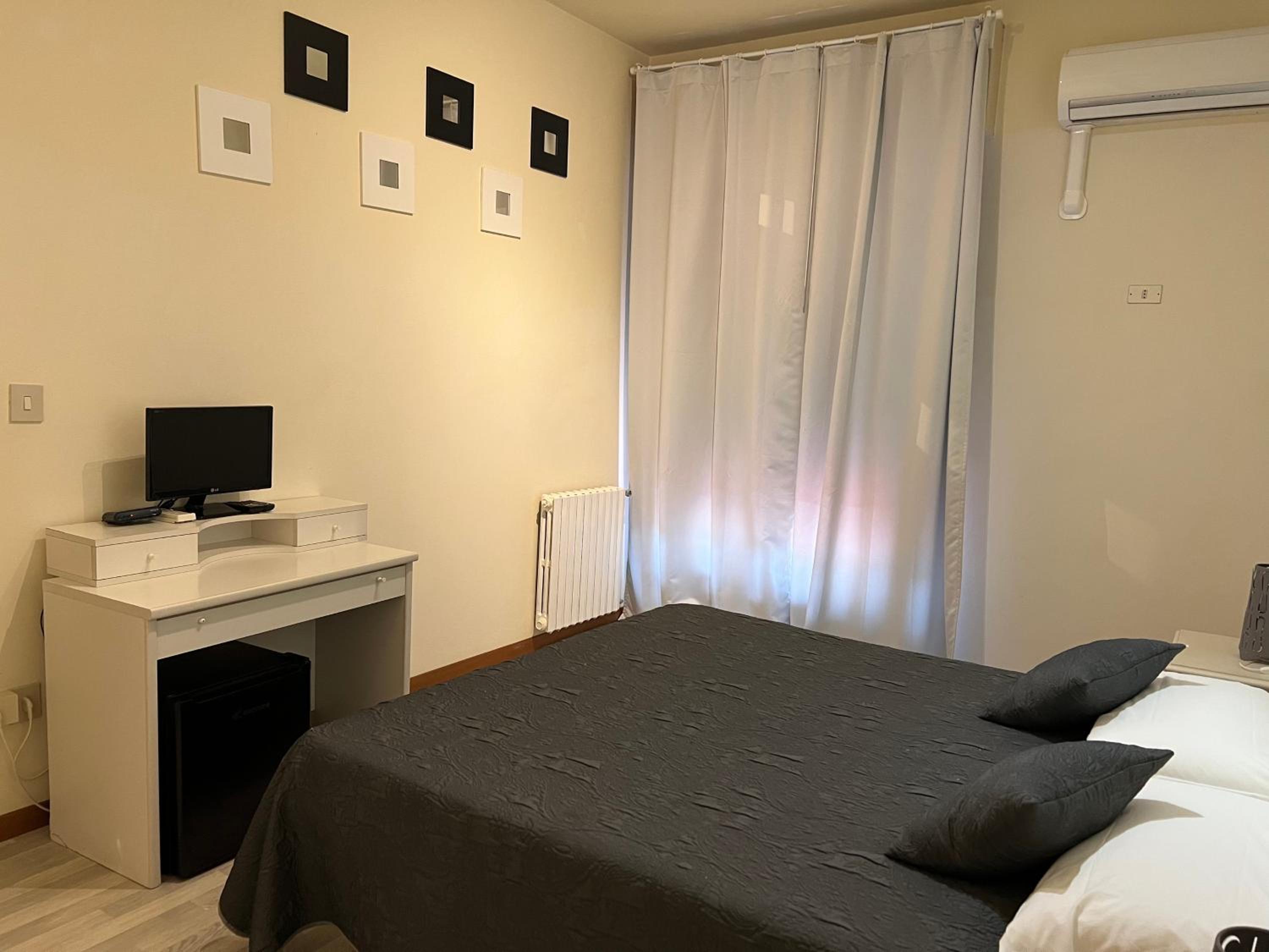 Standard Quadruple Room - Photo 22