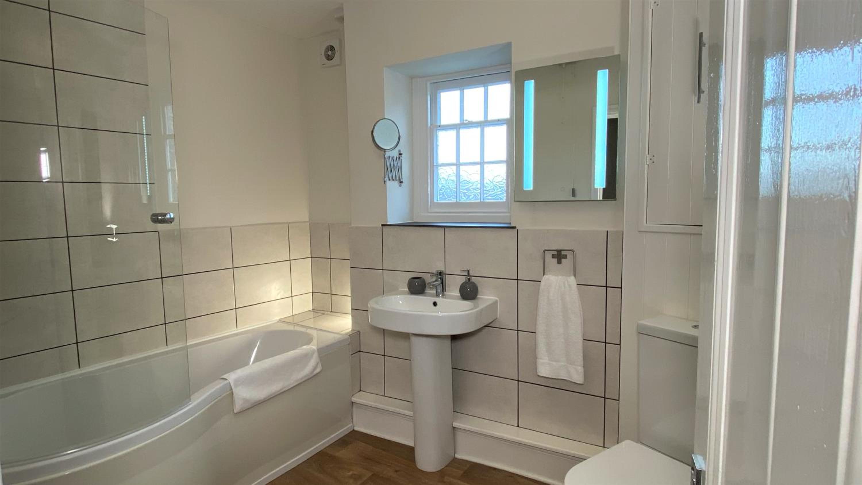 Four-Bedroom House - Photo 17
