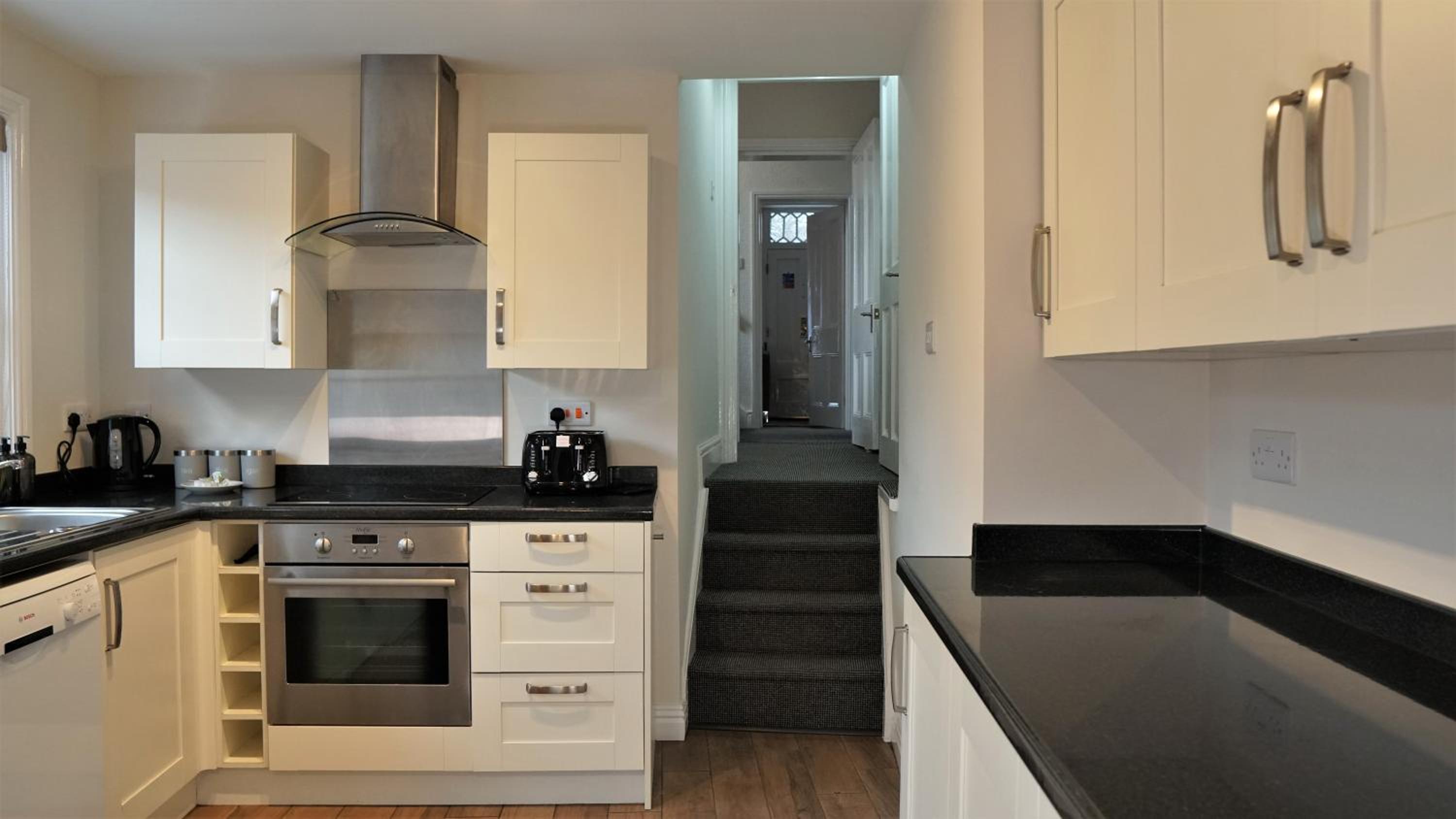 Four-Bedroom House - Photo 32