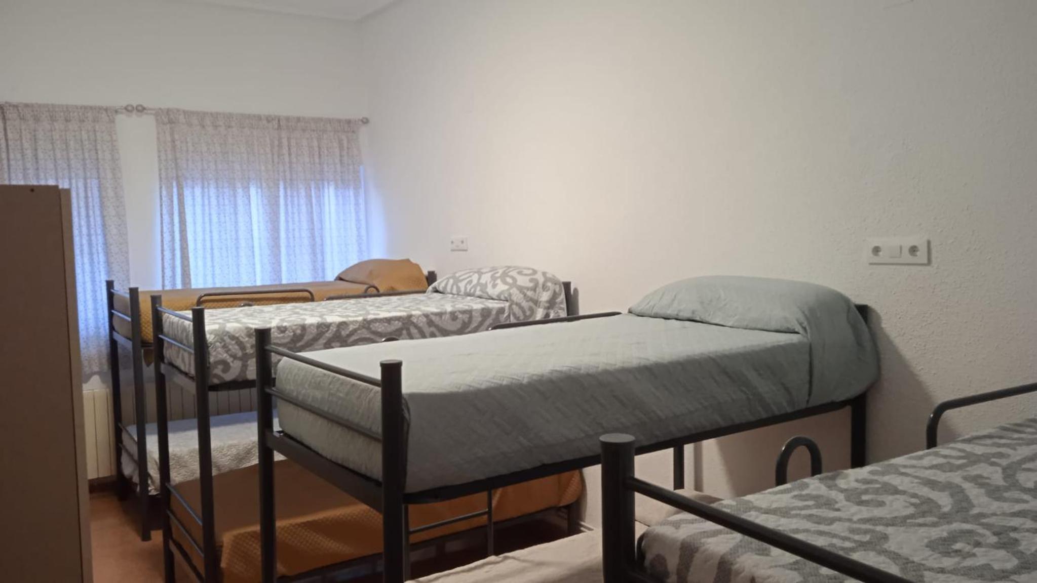Habitación compartida mixta de 8 camas