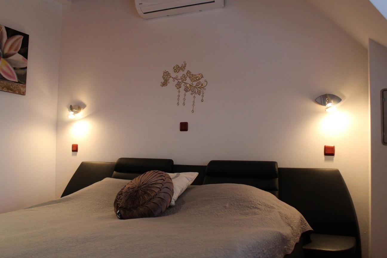 Three-Bedroom House - Photo 22