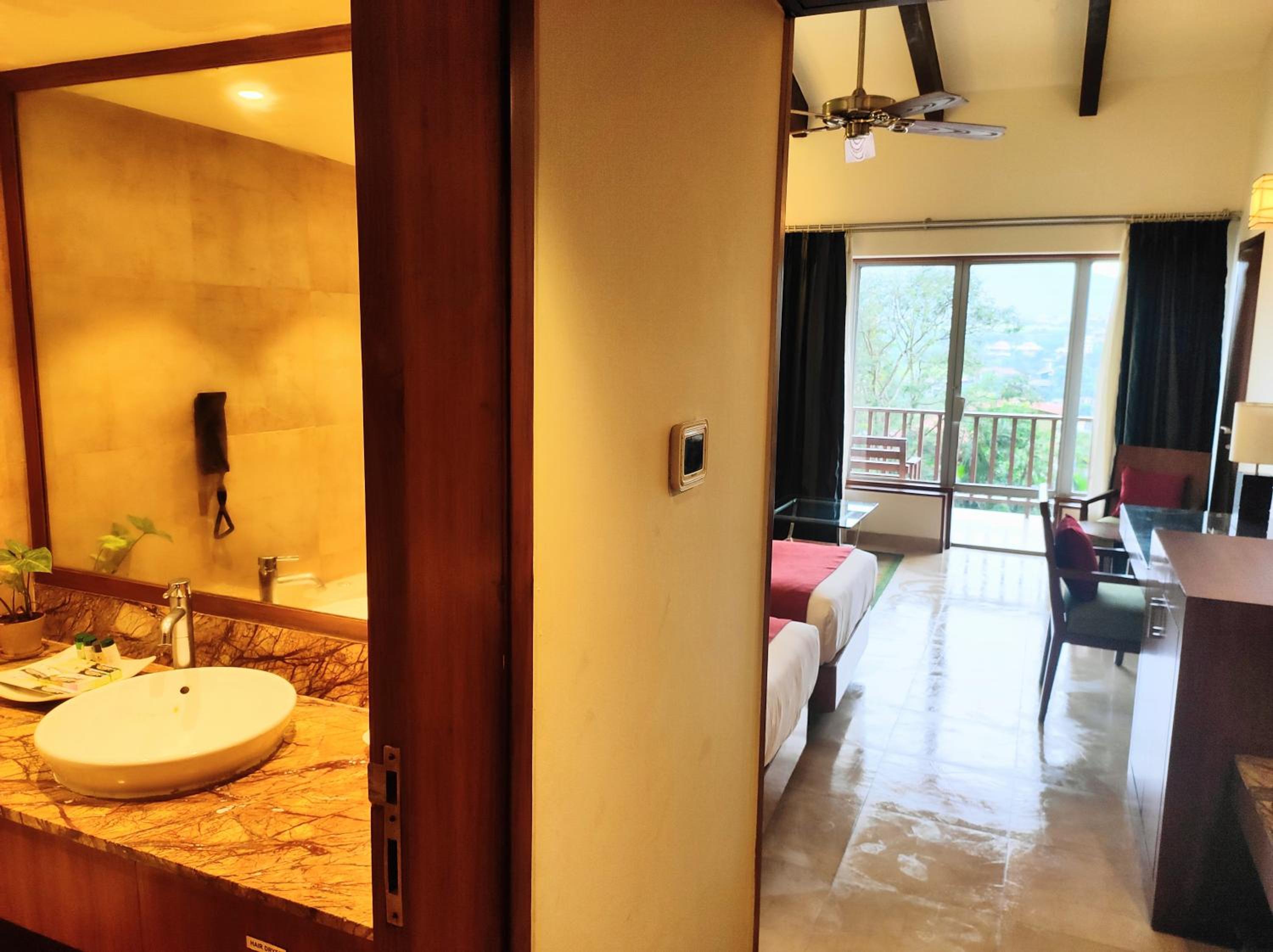 Classic Deluxe Twin with 20% off on Session on Spa , Food & Beverages and complimentary Access to Water Park Rides - Photo 6