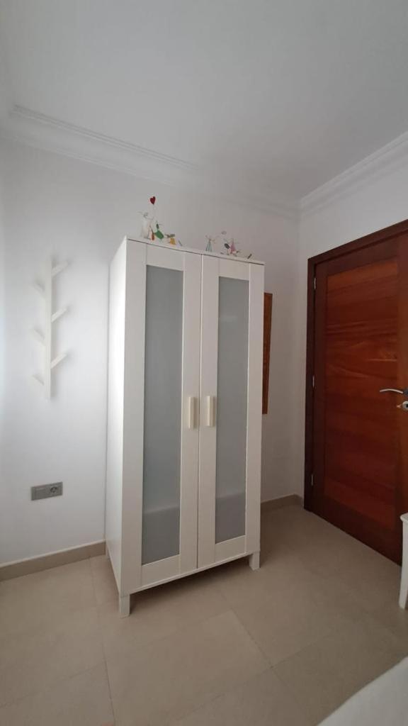 Three-Bedroom Apartment - Photo 28