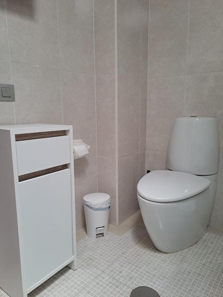 Three-Bedroom Apartment - Photo 24