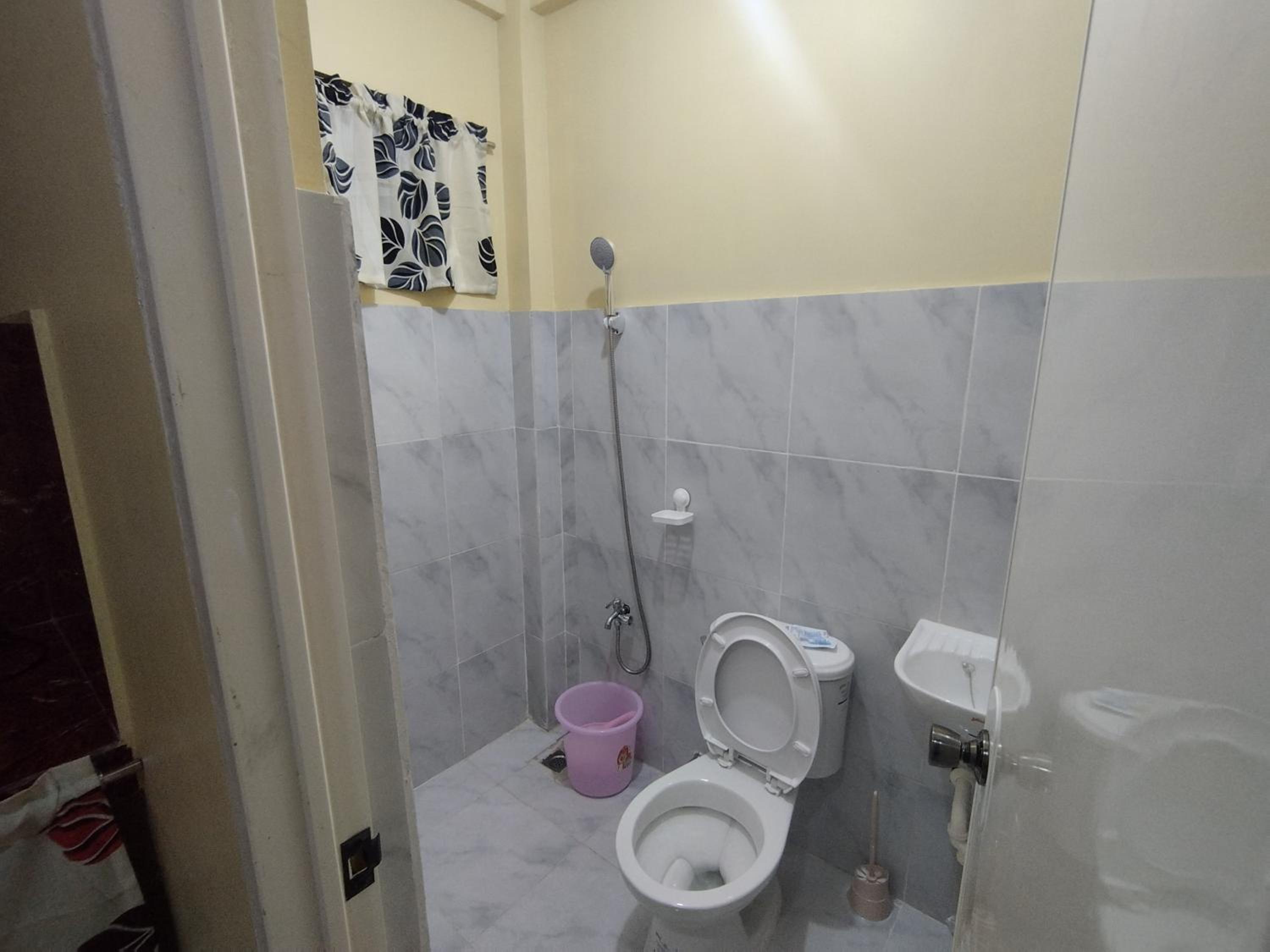 Three-Bedroom Apartment photo 2