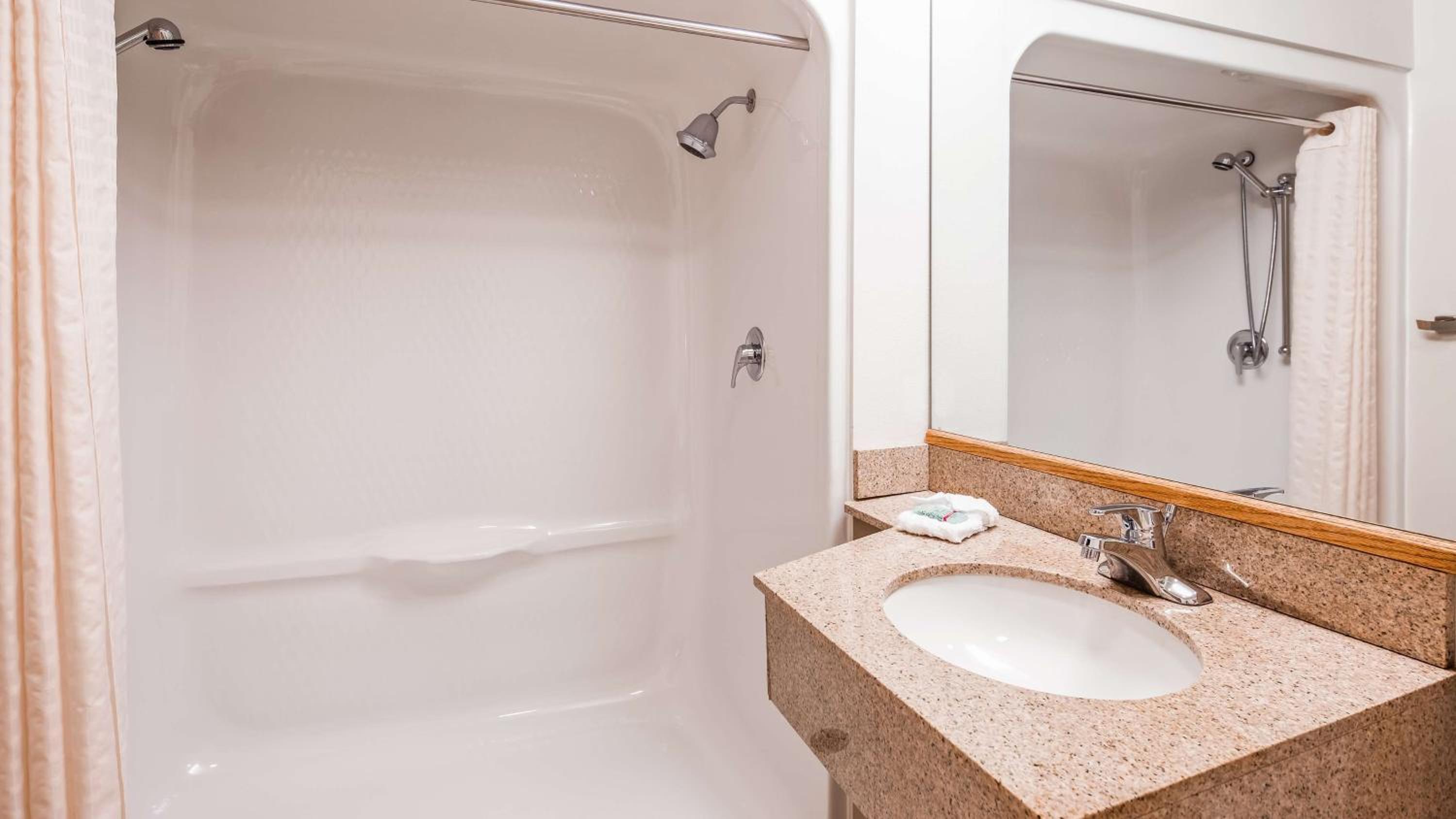 Queen Suite with Two Queen Beds and Sofa Bed - Roll-In Shower/Disability Access photo 3