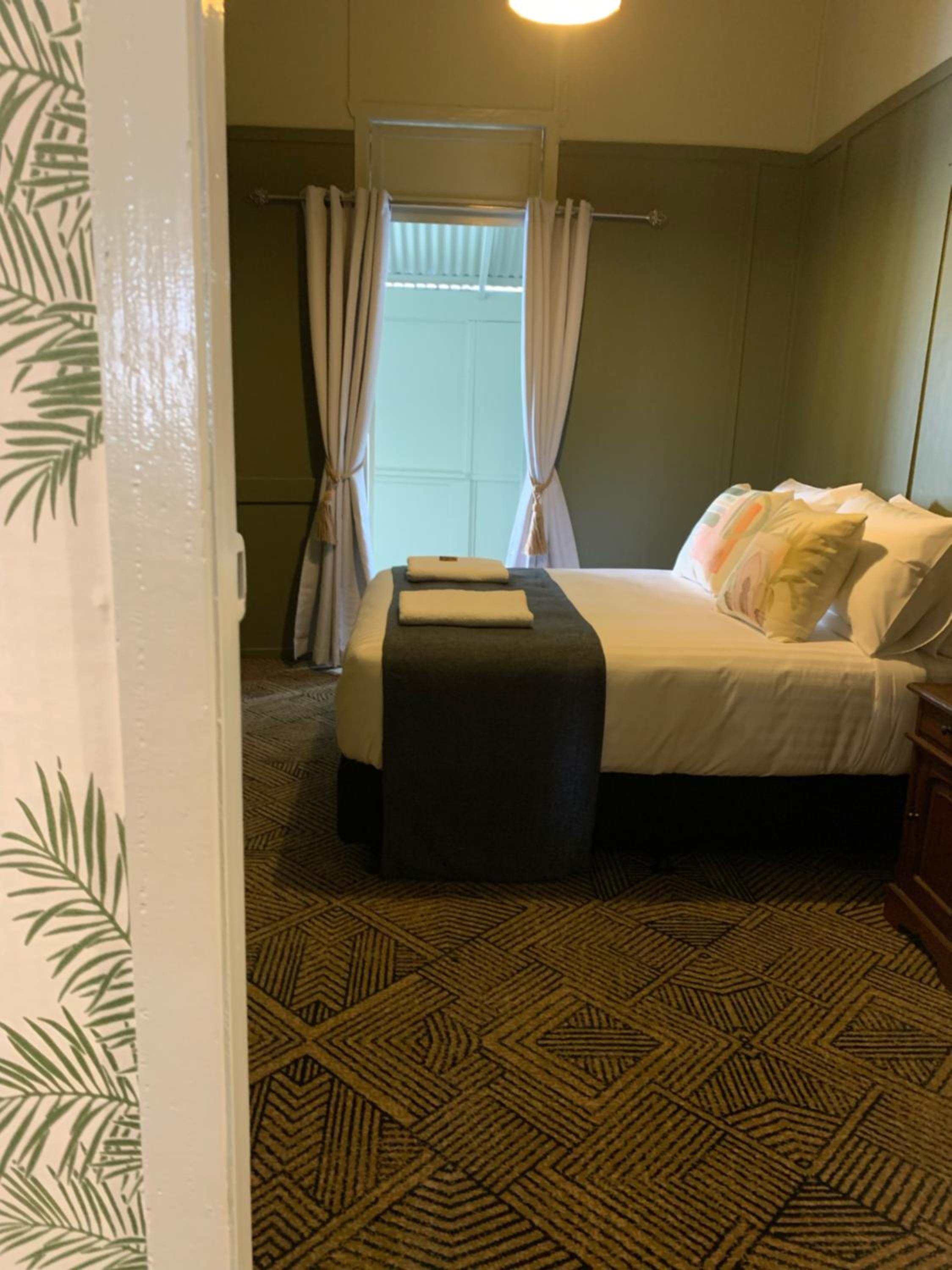 Queen Room with Shared Bathroom