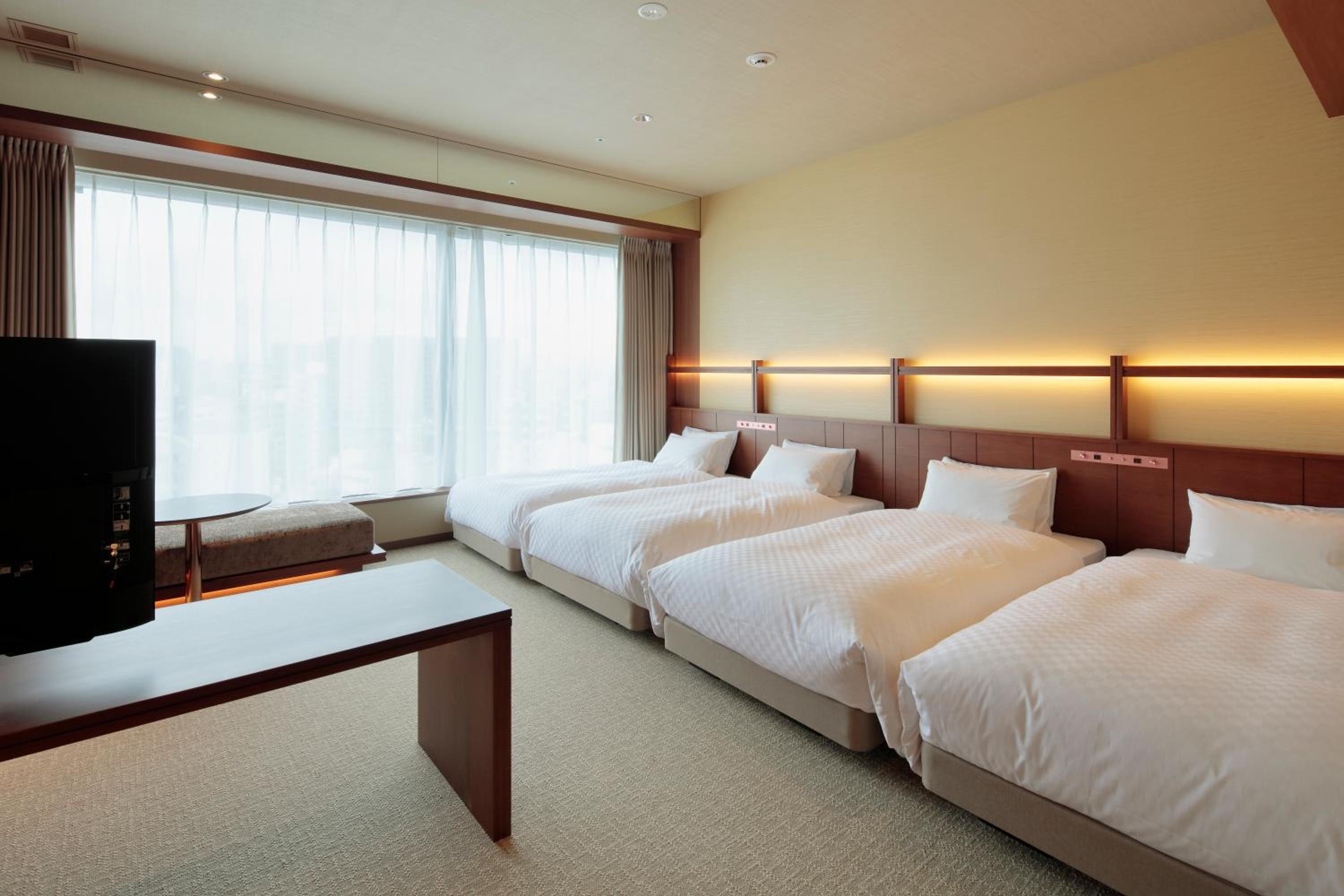 Deluxe Quadruple Room - Photo 1