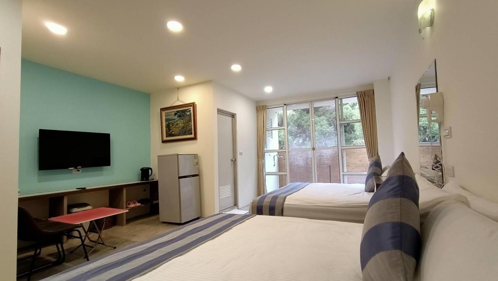 Quadruple Room with Balcony - Photo 1