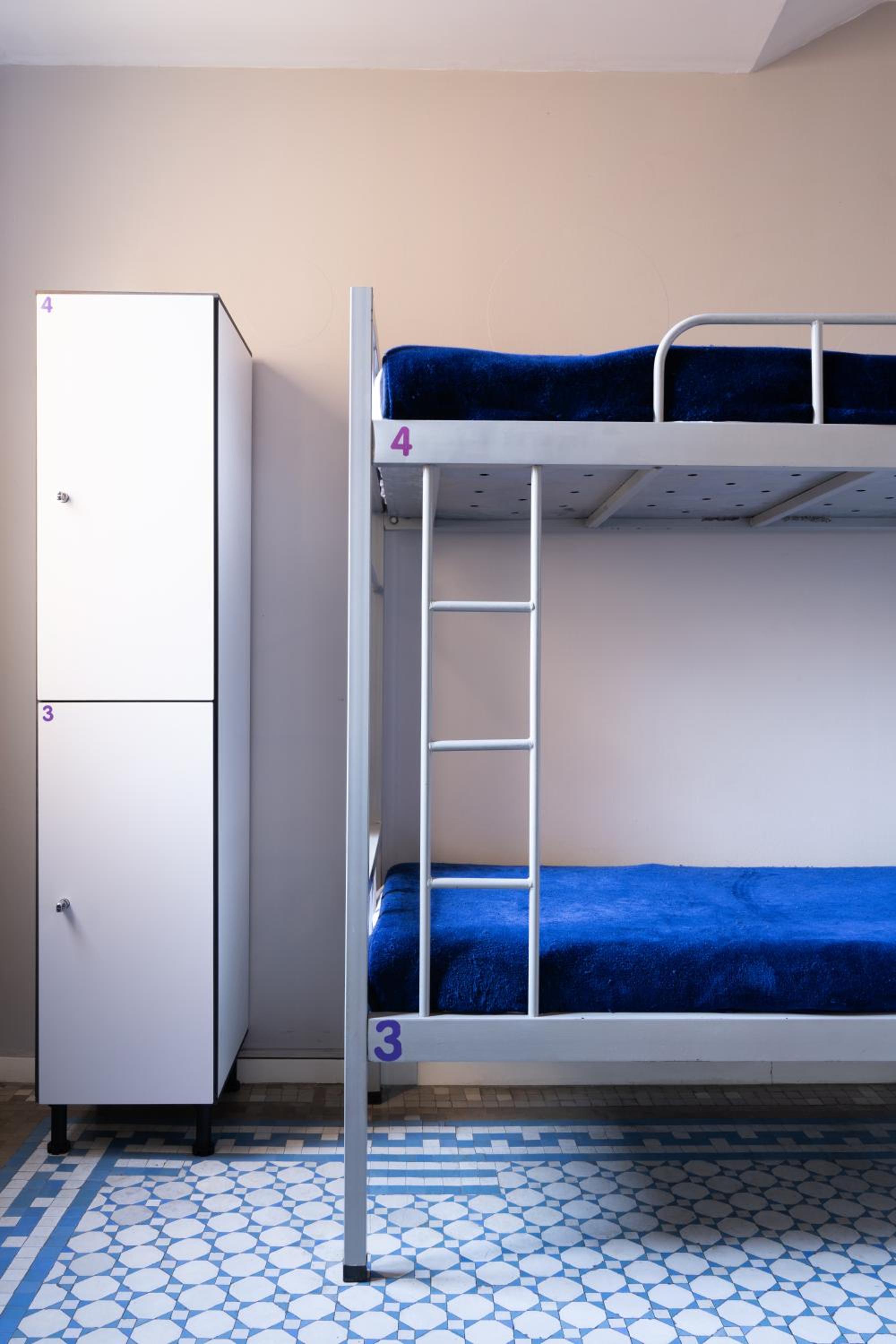 1 Cama en dormitorio compartido de 8 camas - habitación femenina