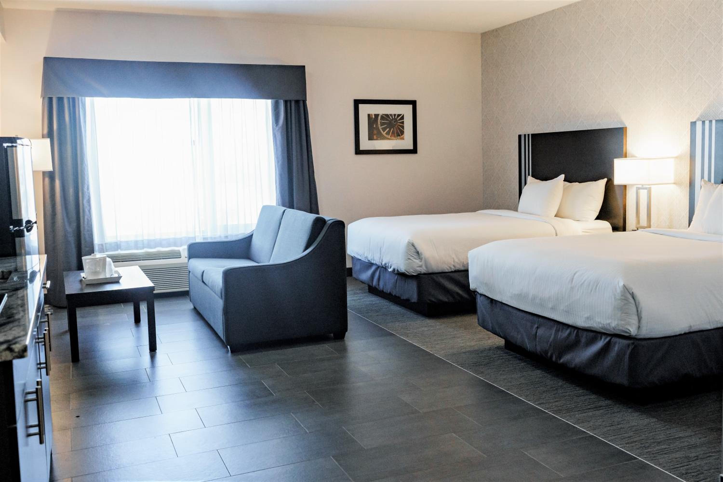 Extended Stay Queen Room with Two Queen Beds and Kitchenette - Non-Smoking photo 1