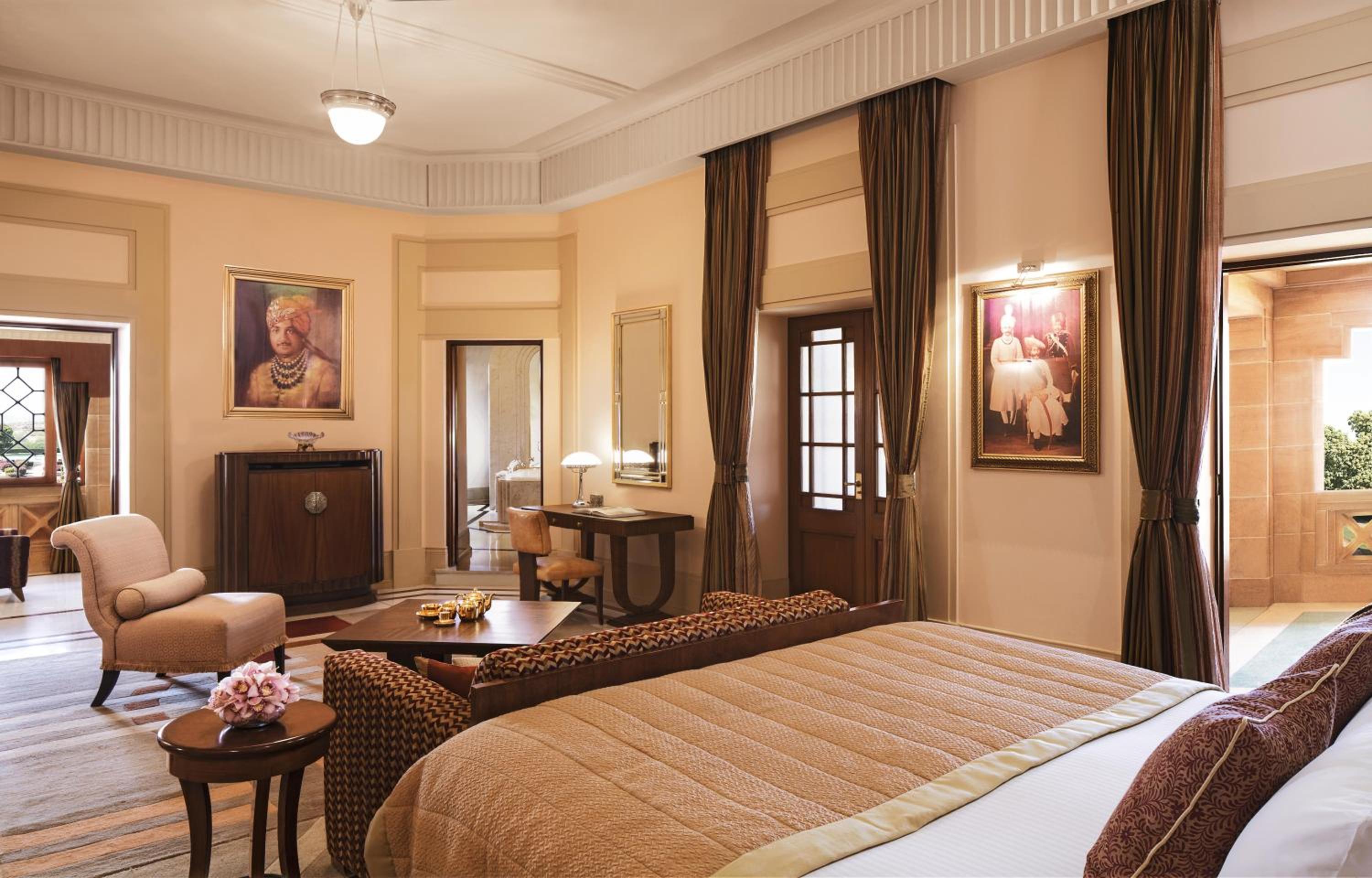 hotel room with a king size bed and sitting area